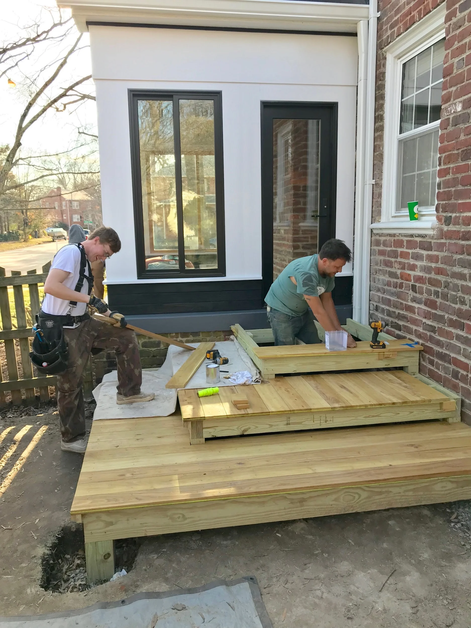 The RIC design build crew (Hunter and Nate) installing black locust decking