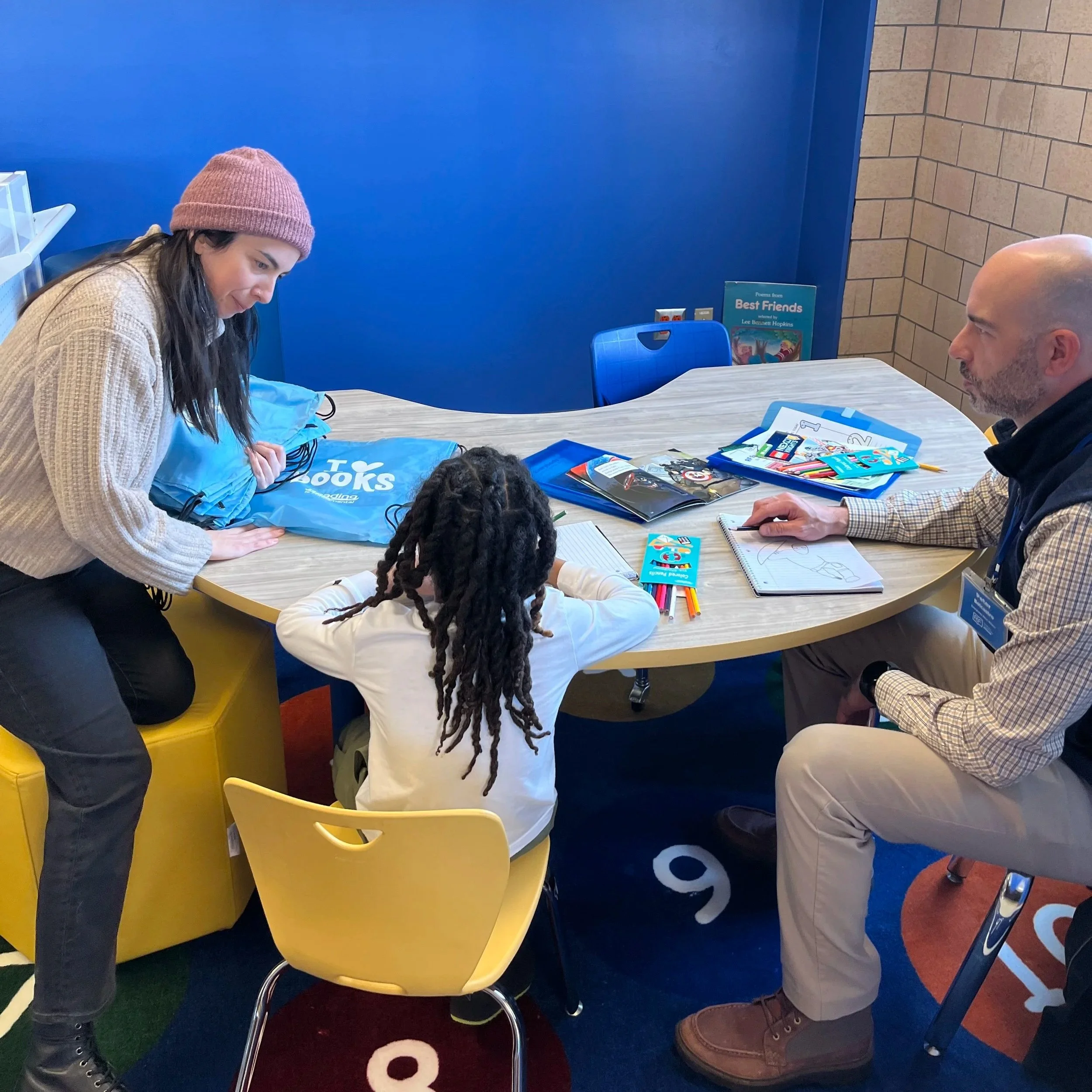 Turnitin and RIF Pittsburgh Delivers Books into Kids' Hands at MACS and PPS Weil