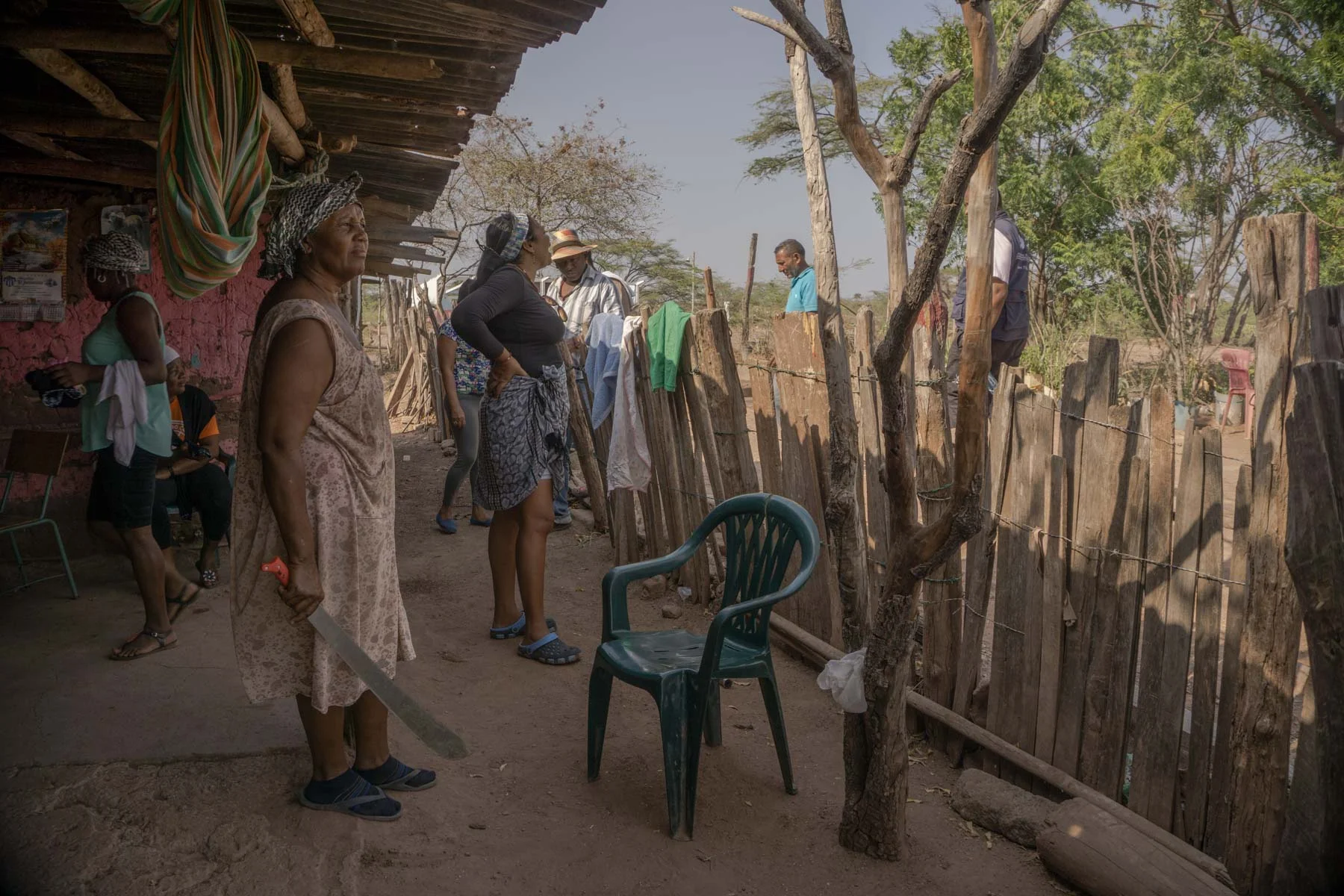 A woman guarding her home on the day the authorities of the municipality of Barrancas in La Guajira along with police in riot gear arrive to the Roche community to evict the last family whose families standing in resistance.