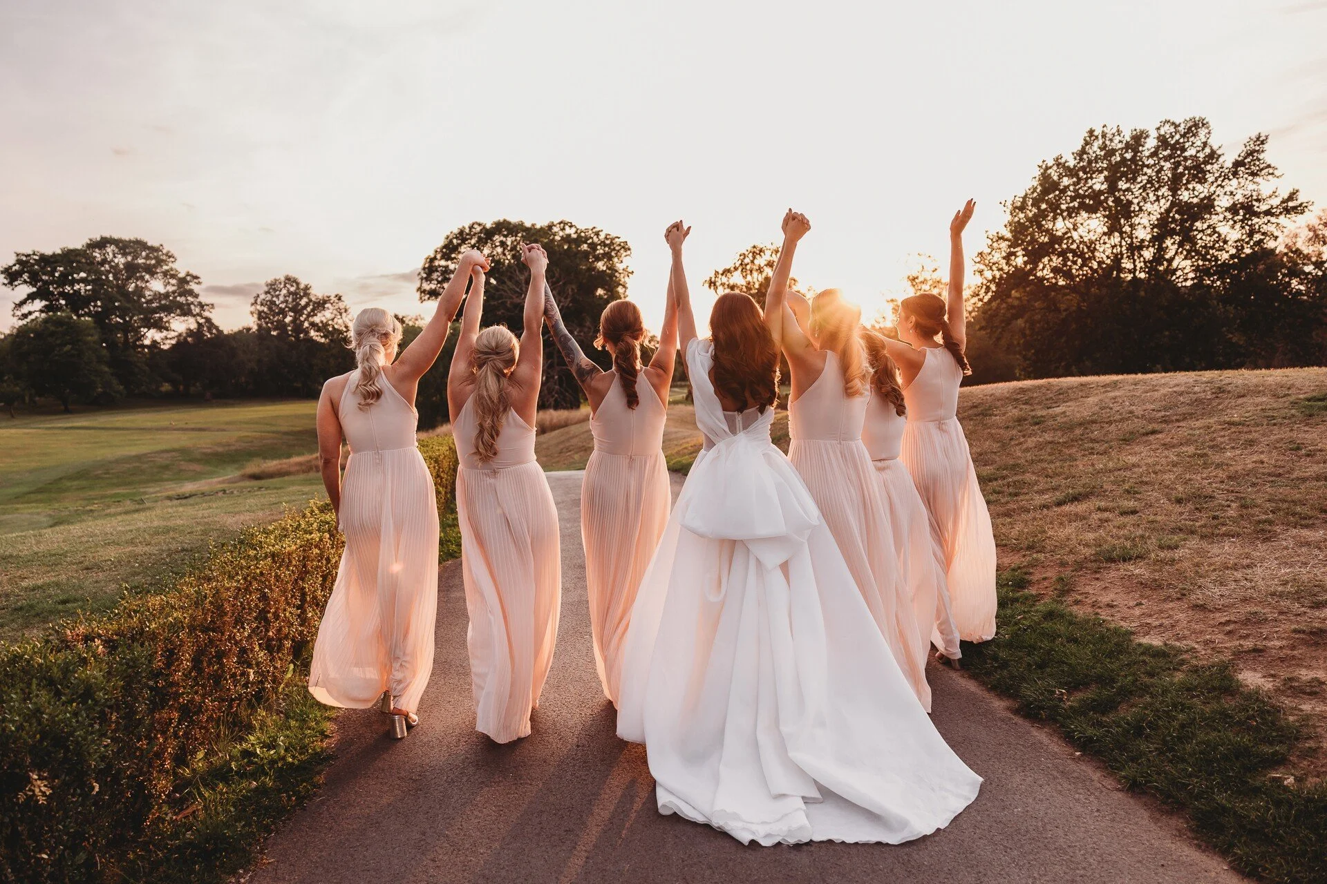 Bridesmaids photo at sunset 