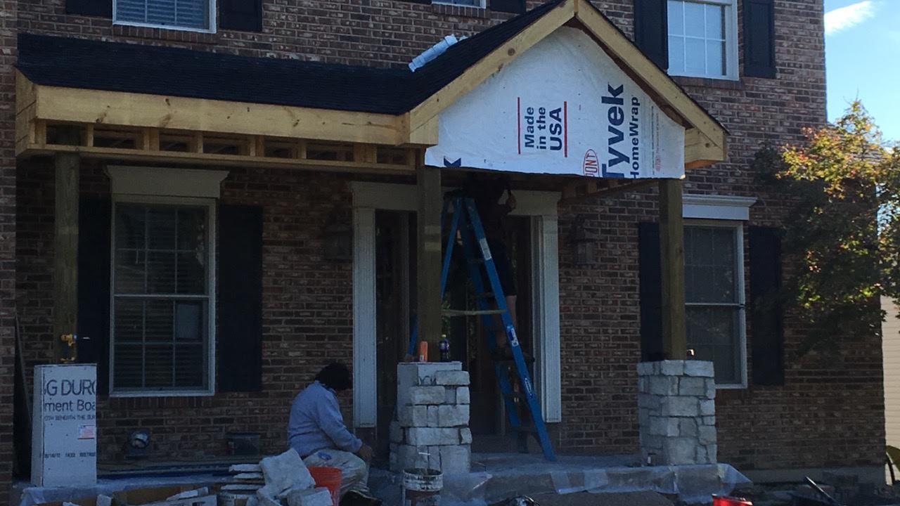 New front porch with stone columns