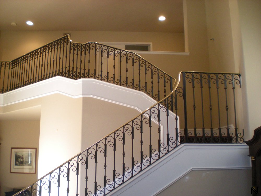 Vertical Banisters with Spiral Accents and Golden Handrail Staircase Railings Design Ideas Naddour's Custom Metalworks