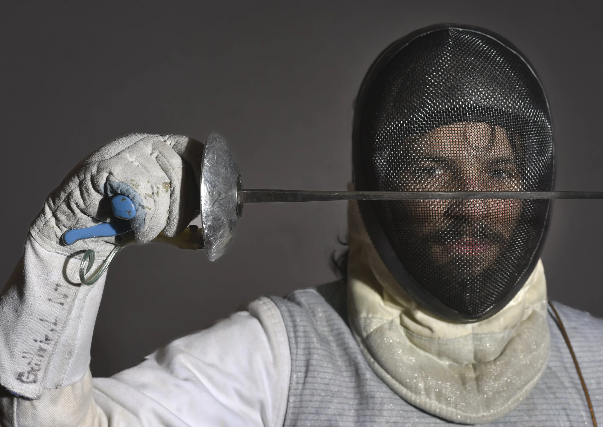  Liam Guthrie, 22, president of the RIT Fencing Club holds up his saber at the Student Life Center at RIT in Henrietta, N.Y., Nov. 15, 2022. Guthrie is a double major of Game Design and Development and History. “I’m a very competitive person,” Guthri