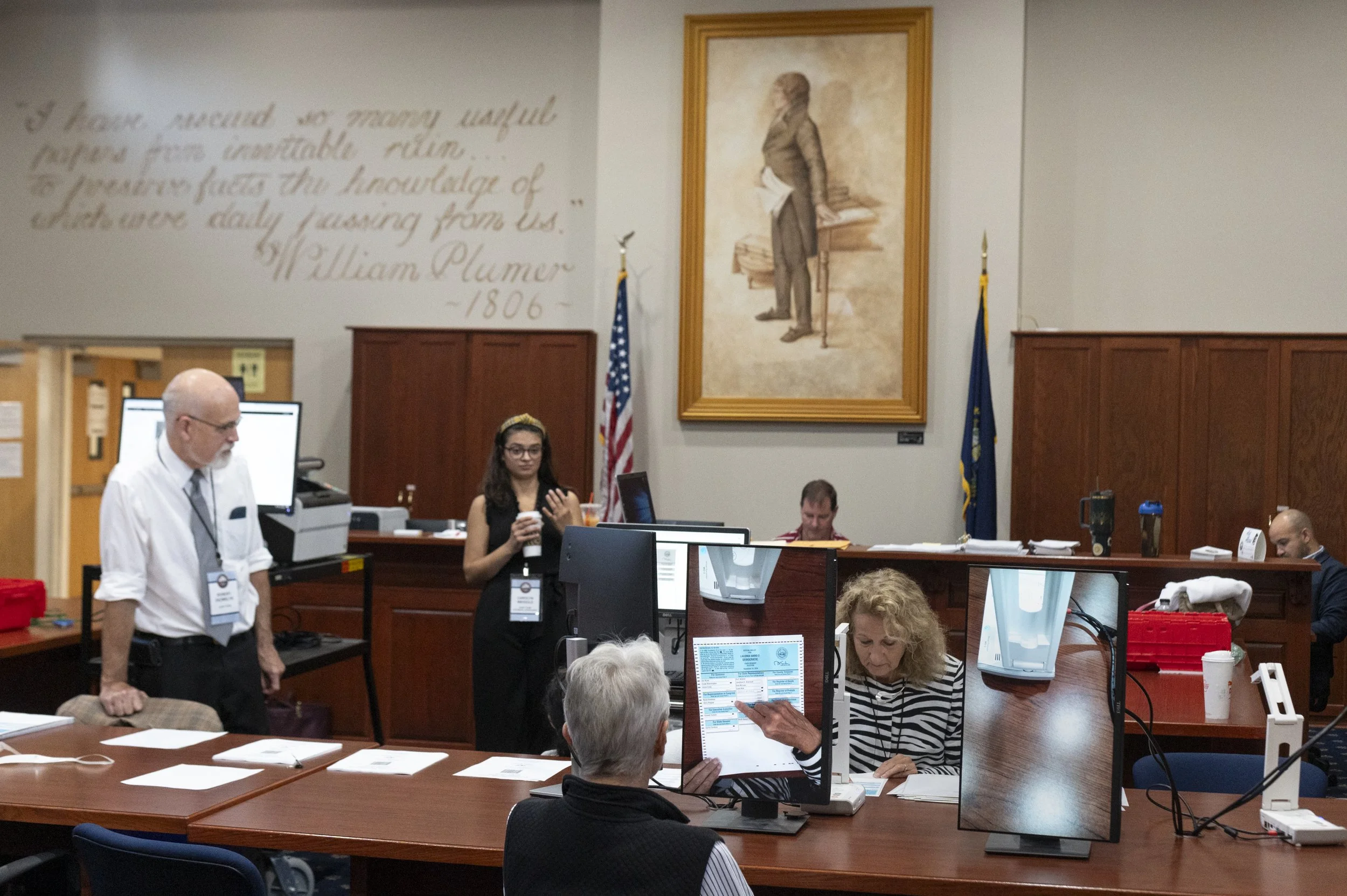  The audit team observes as ballots are audited from a voting machine in Laconia Ward 2 at the NH Records and Archives building, in Concord, N.H., on Sept. 12, 2024. Laconia Ward 2 was one of 10 randomly selected locations to be audited after the sta