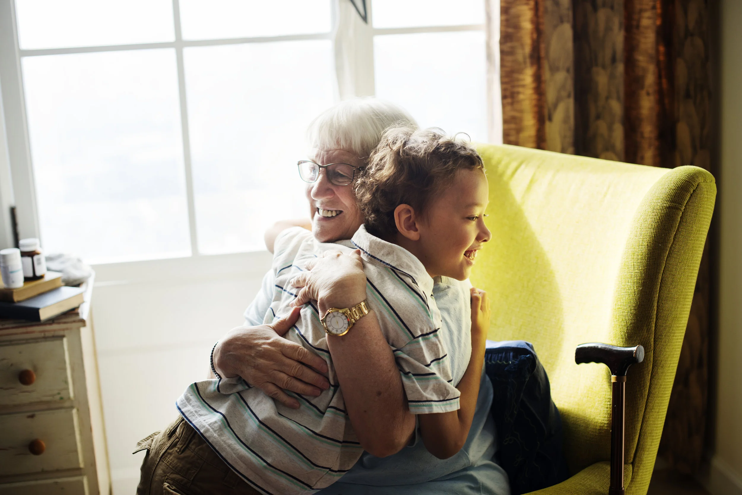 grandma-and-grandson-hugging-together-PZ4M45A.jpg