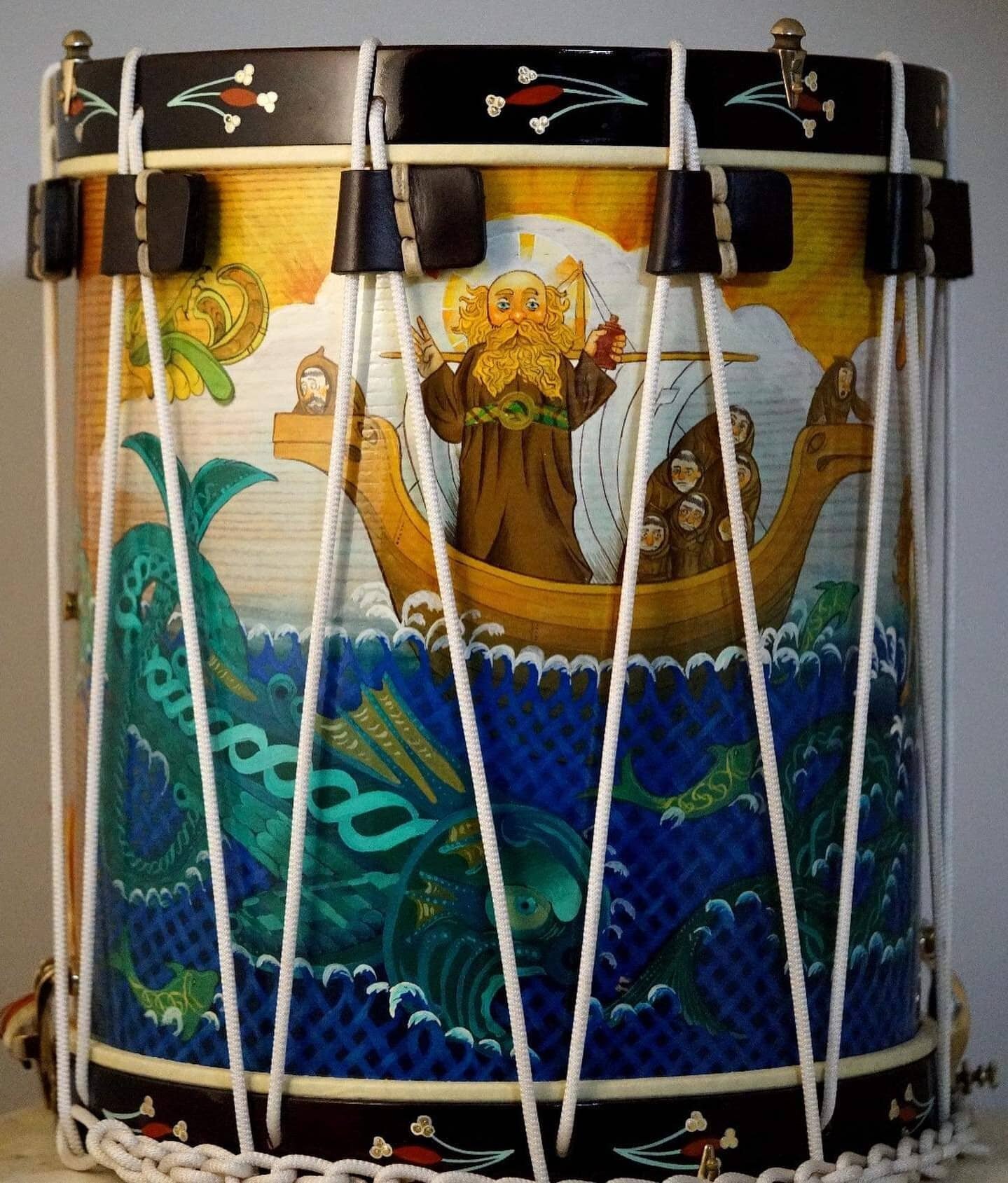   Completed earlier this year for a Loyal Drums endorser. After working through designs and composition ideas with the client, the drum was painted showing a vibrant seascape in blues and greens, under a brilliant golden sunrise to depict the journey