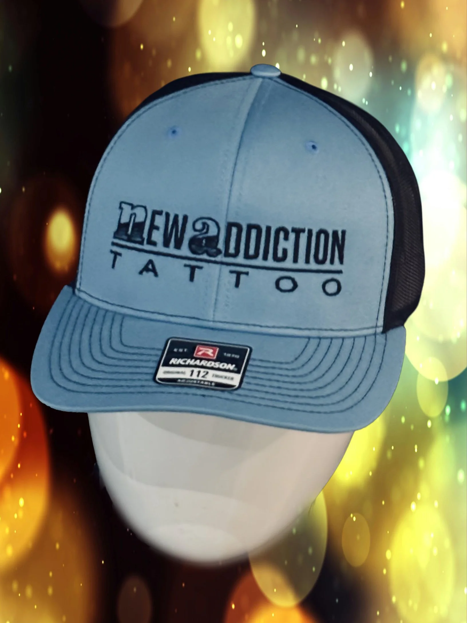 Blue black snap back trucker hat.jpg