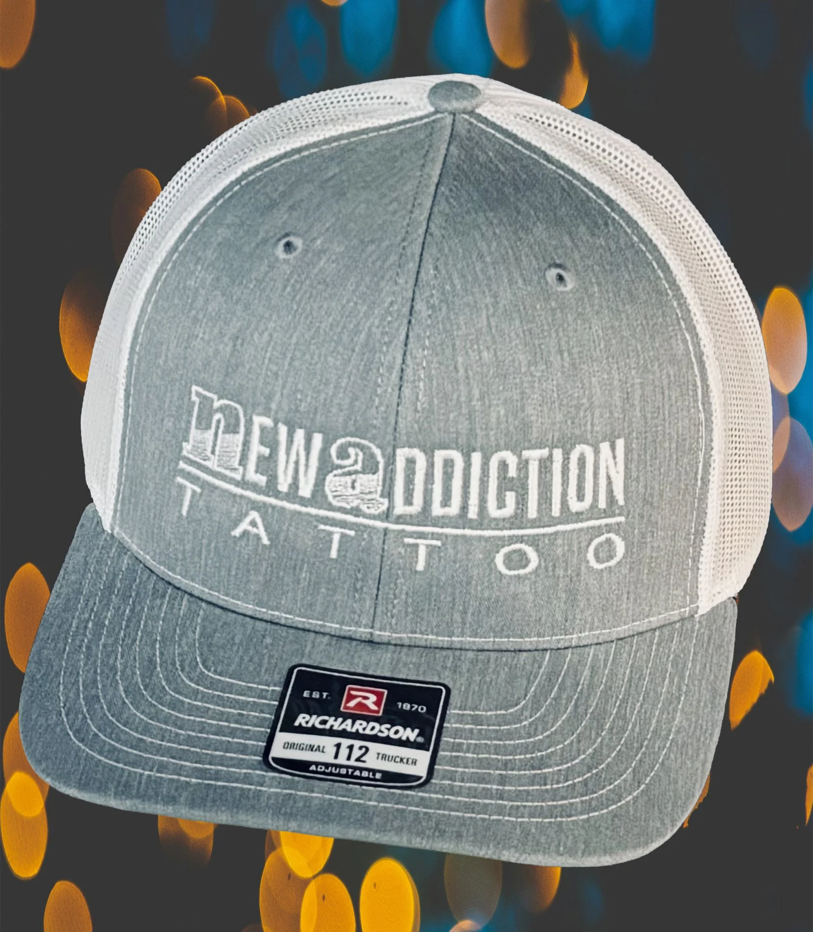 Gray and white snapback trucker hat.jpg