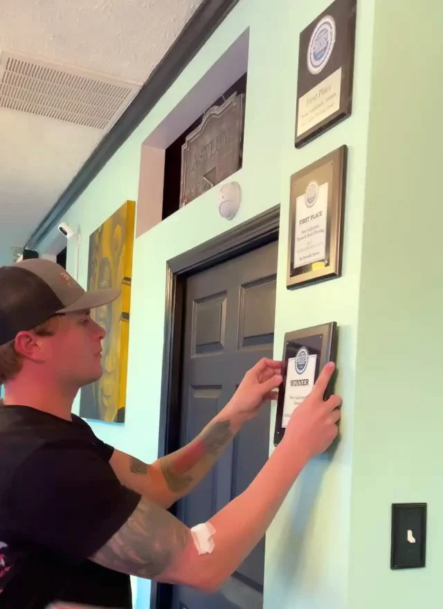 bryans winner plaque video_Moment.jpg