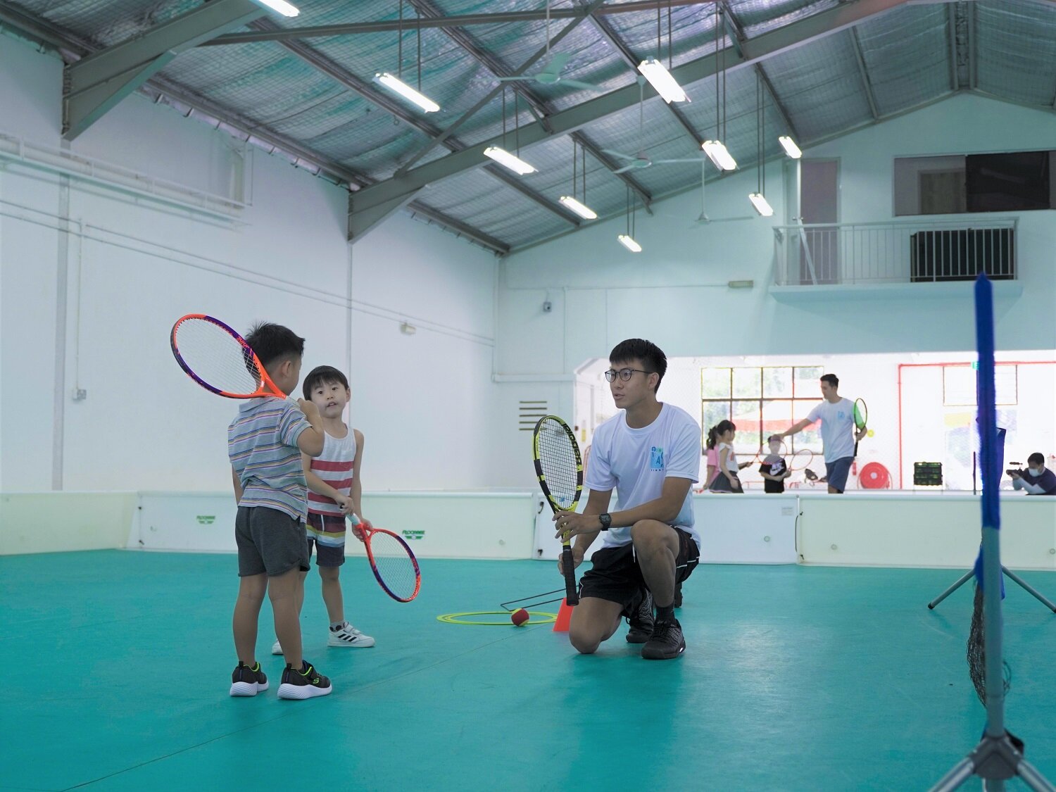 Tennis-Lessons-Camp-Kids-Indoor-Court.jpg