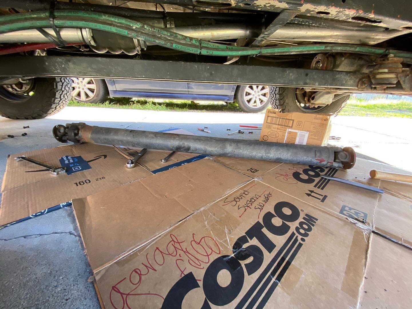 Bad vibes.  Yep rear unjoint died and the front could feel better.  Going to try 318 replacement ujoint parts and try to make a 90 zerk fit for easy access later.  And repack grease to the inner bushing at the doughnut. Anyone have luck doing so???