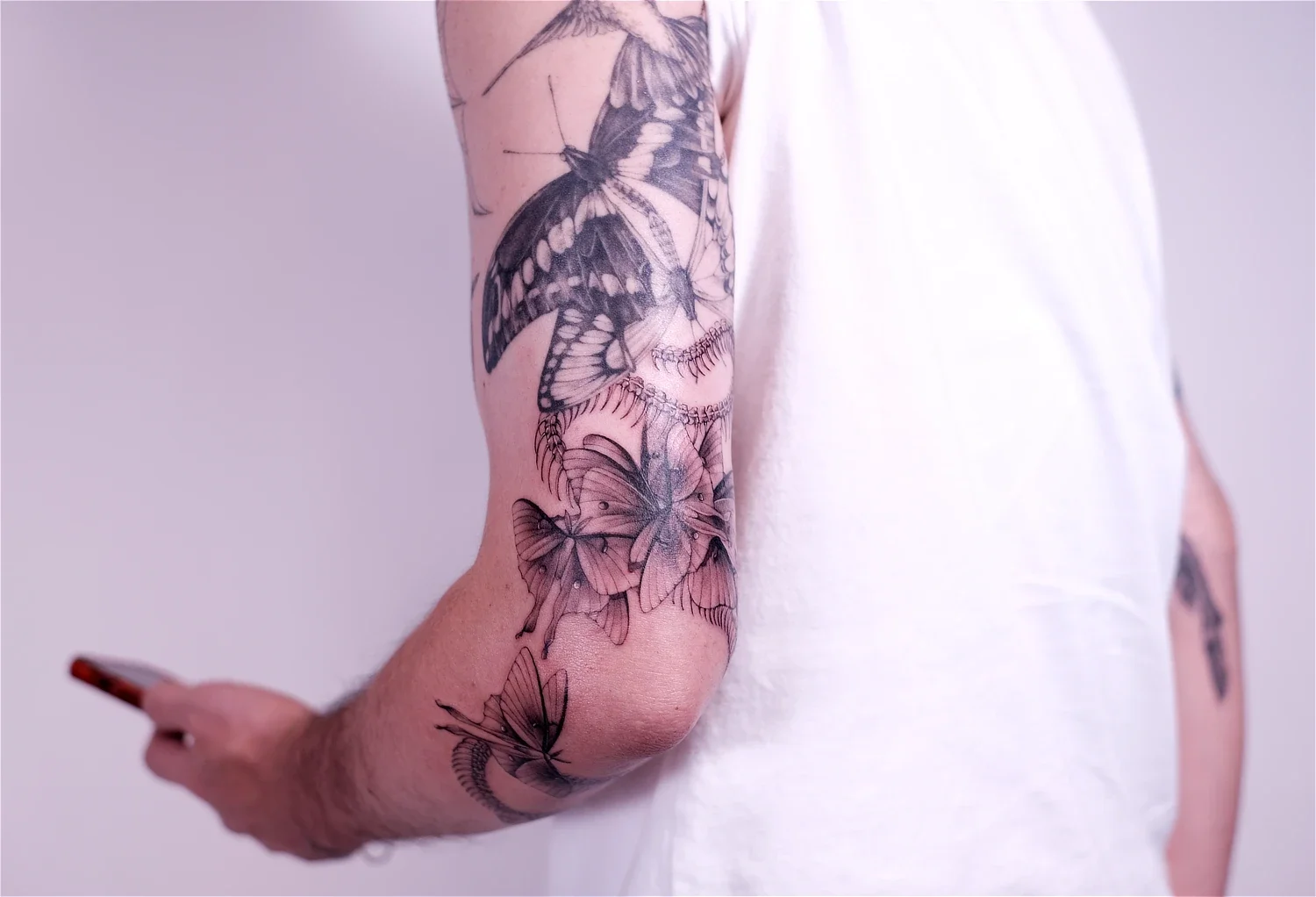 fineline-tattoo-snakes-skeleton3.webp