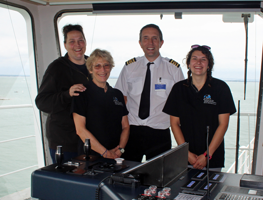 ORCA volunteers on board Victoria of Wight to survey the Solent with Captain Dave Booker L-R Emma Howe-Andrews, Jo Jaeckel, Captain Dave Booker and Katie Rapson