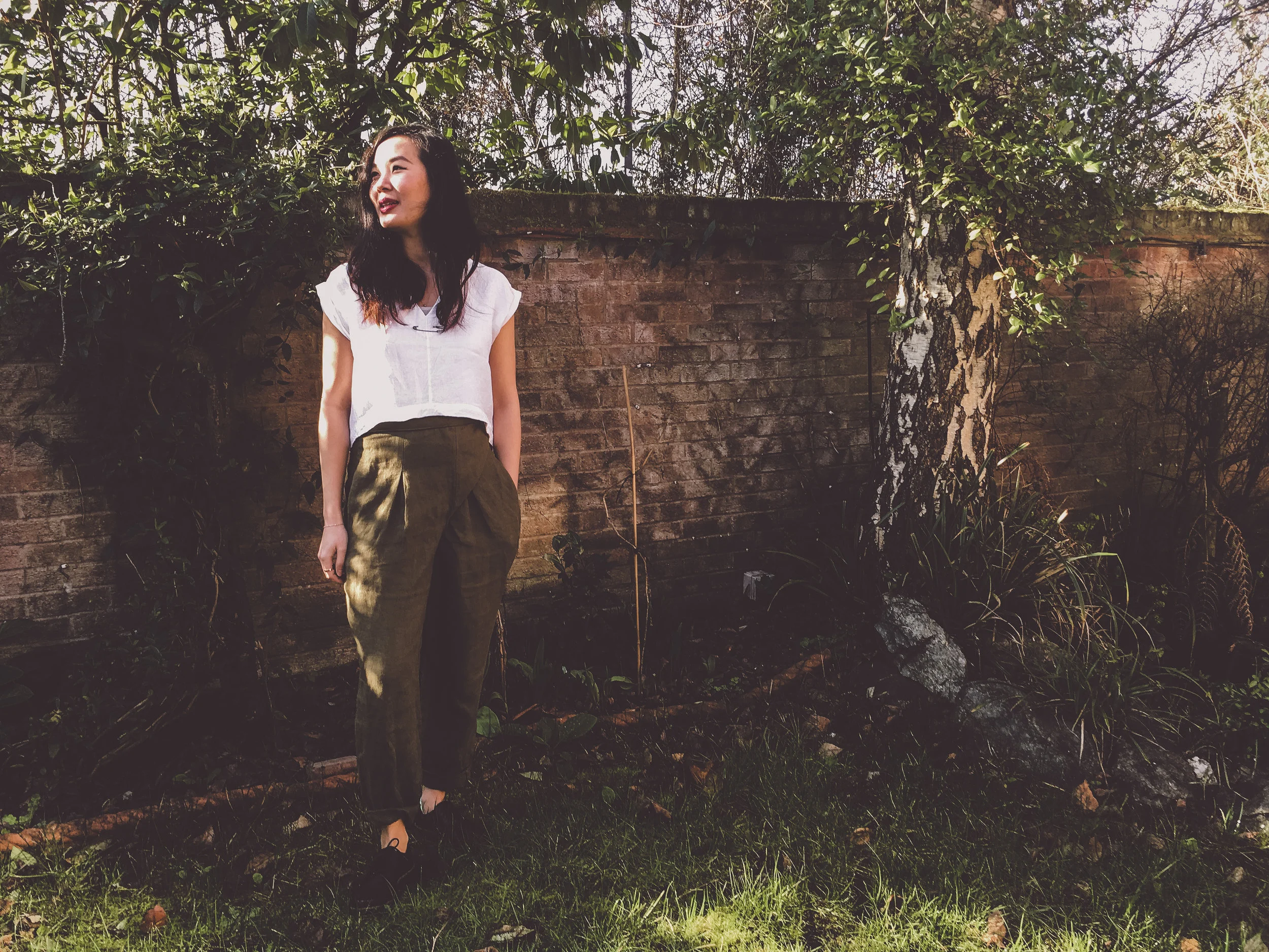 Neera in the Shard Shirt and Wrap Trousers in Sage. Photographed by Rosy on her phone - you don’t need a fancy camera to take part in #wanderingflint!