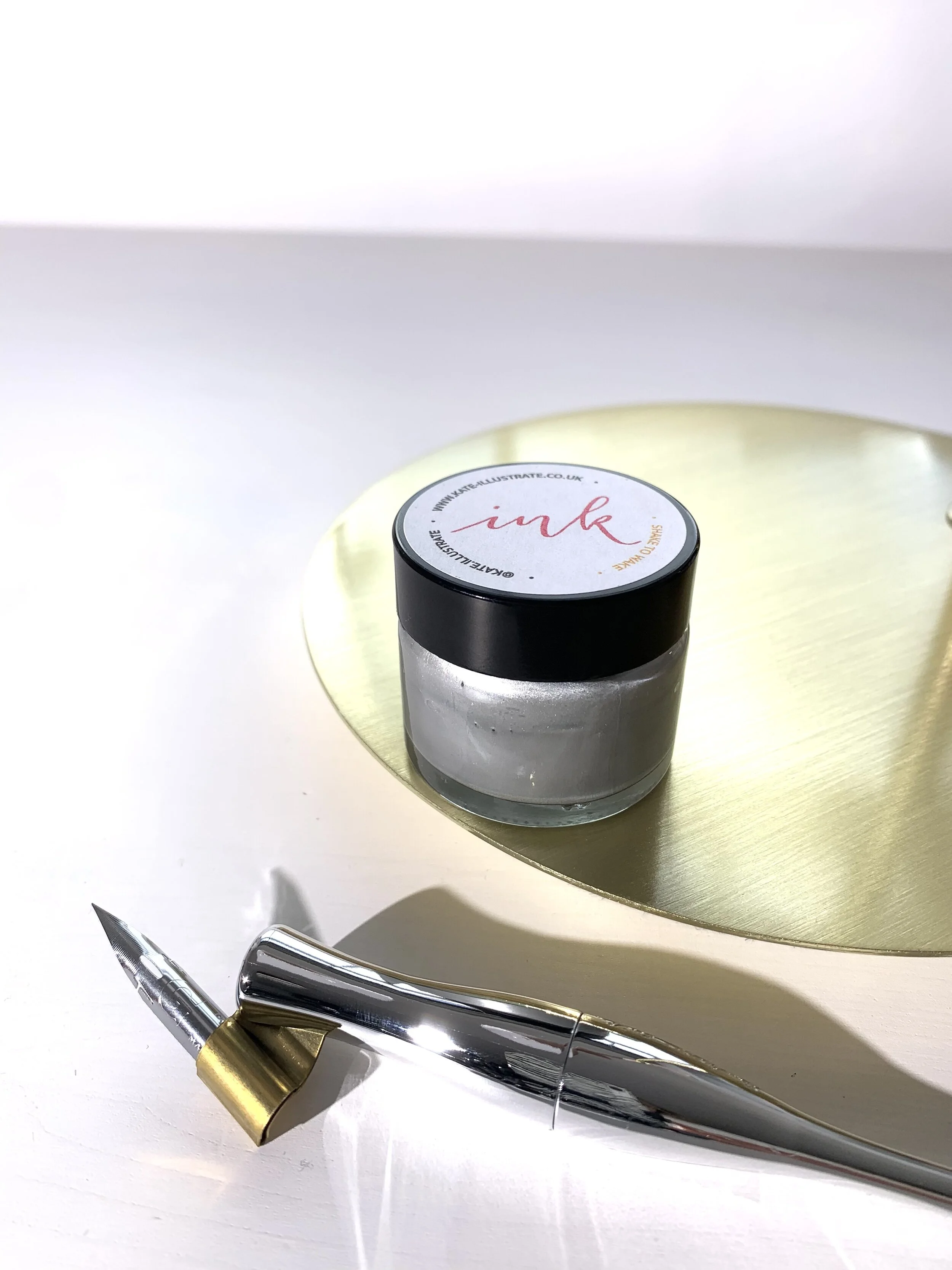 Silver penholder and ink