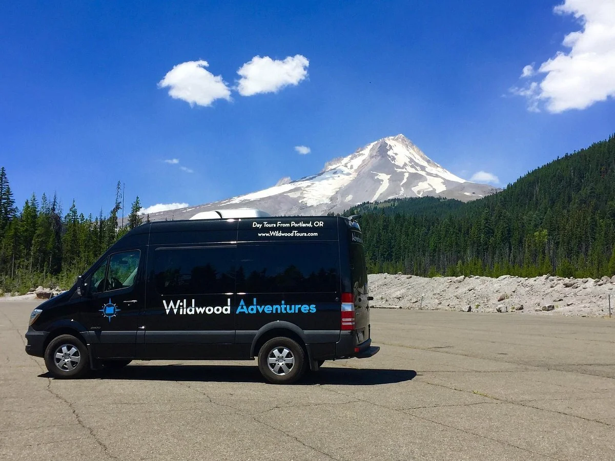 Wildwood Adventures van with Mt. Hood in the background.