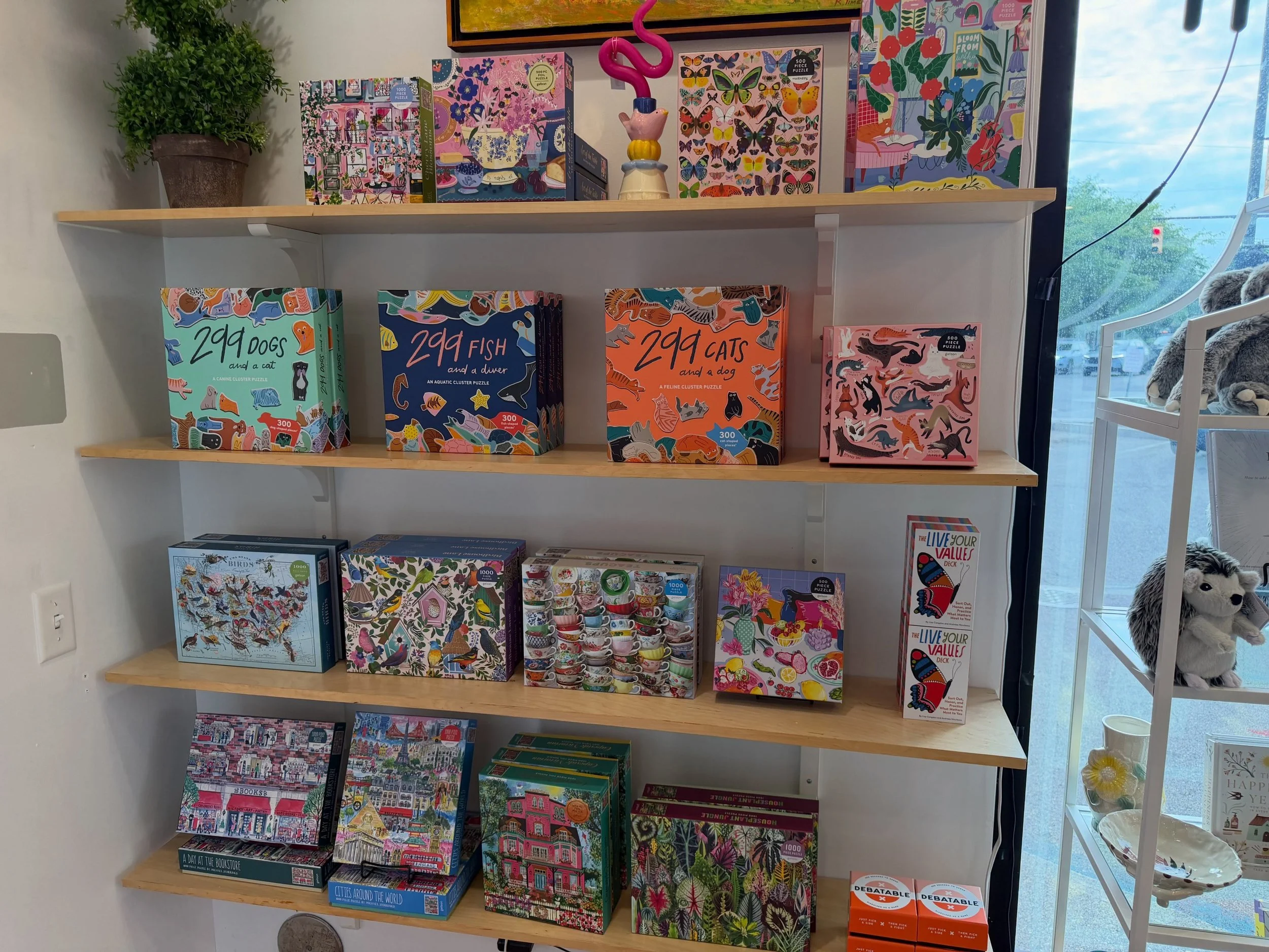 Check out our fun and always changing puzzle collection! Open 10-6 today! #uptown #eastowngr