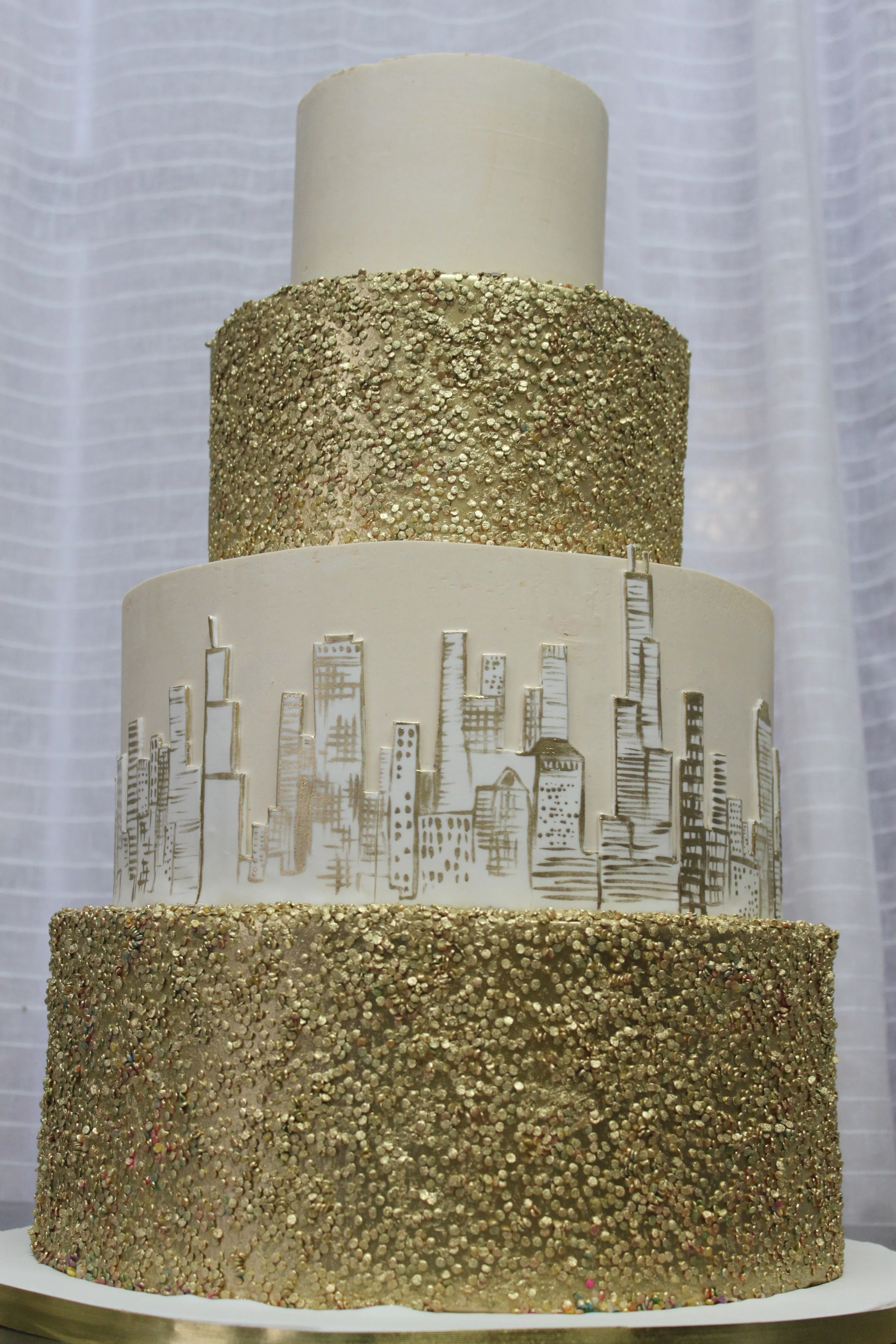 Gold Confetti & Skyline Wedding Cake