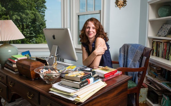 Alyson at desk.jpg