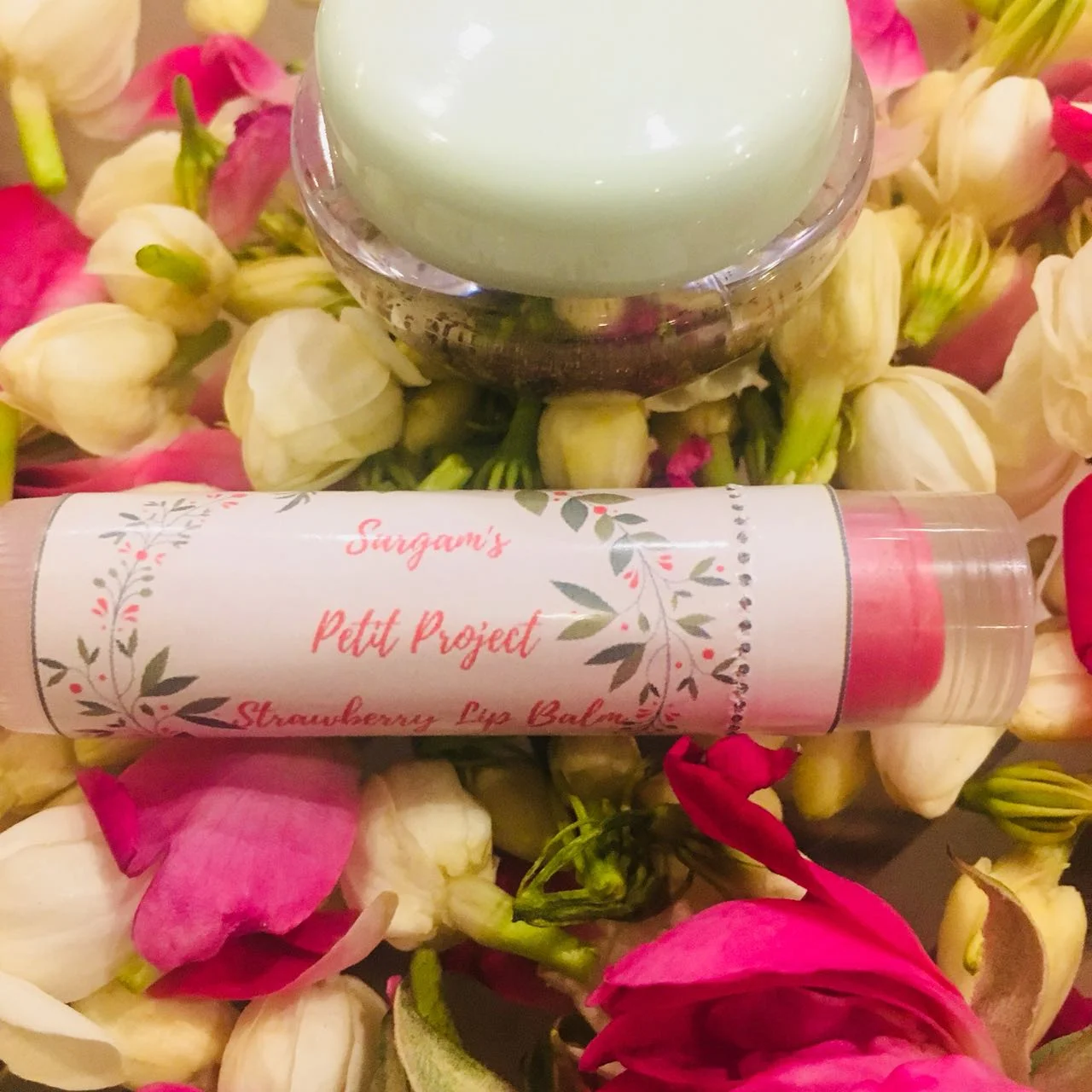 Scrumptious strawberry lip balm and coffee grounds lip scrub. 