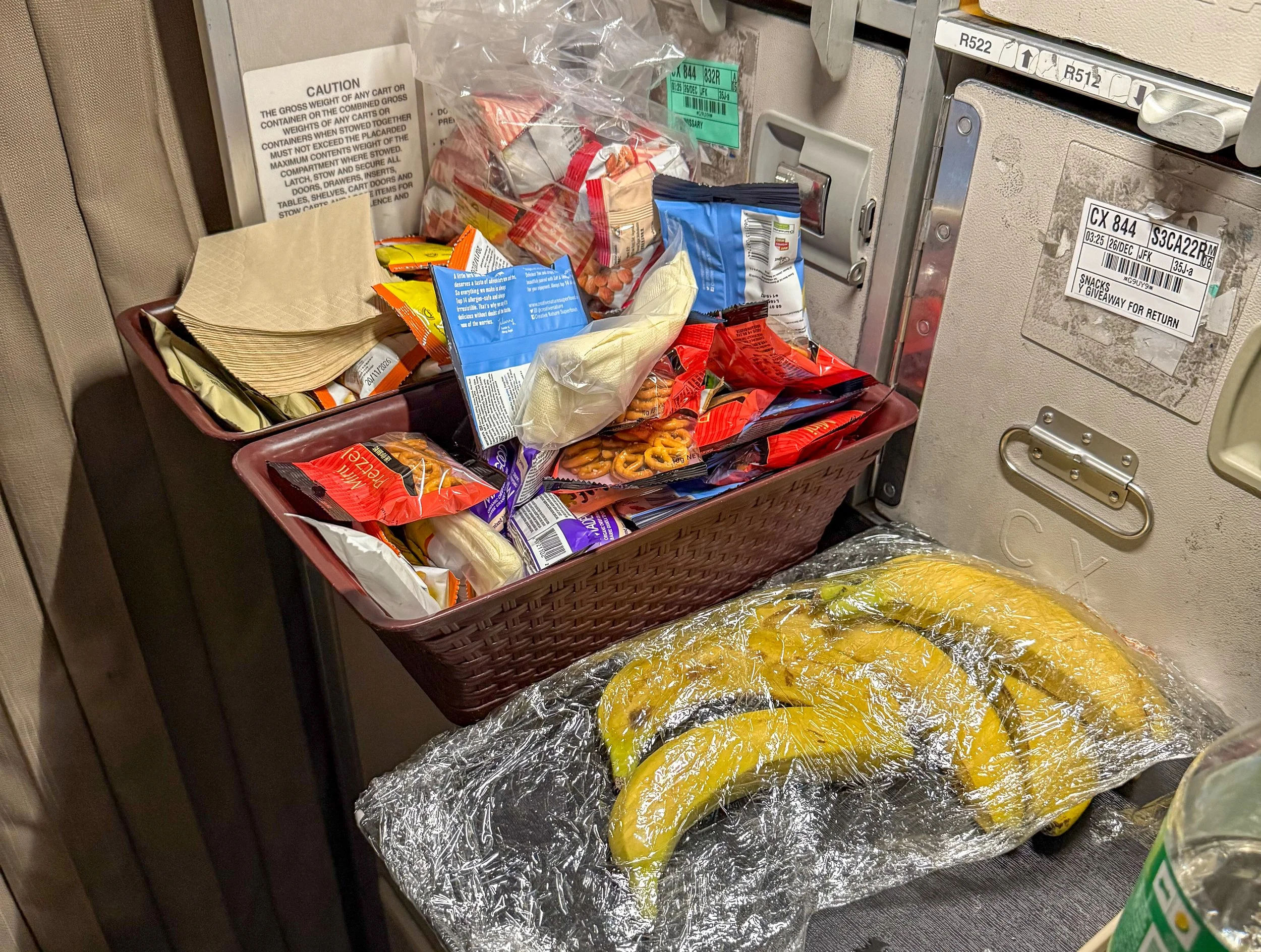 Snacks on Cathay Pacific CX841 New York City to Hong Kong Economy Class. Image: James Hayes.