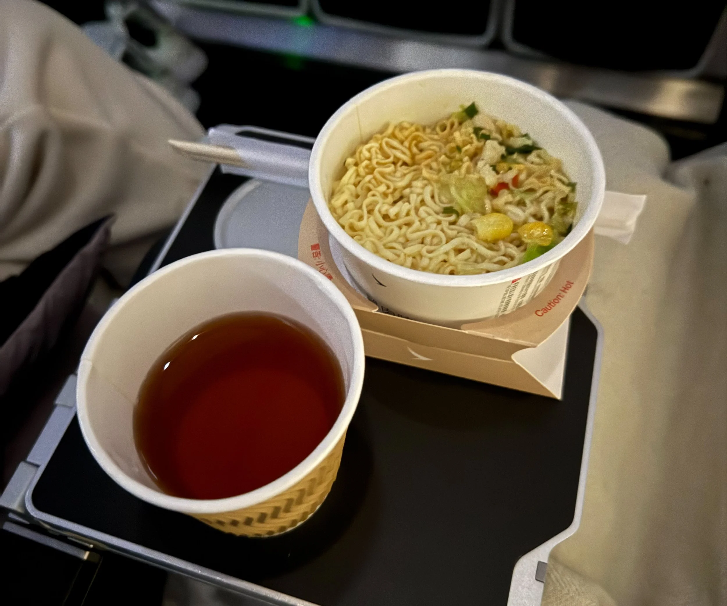 Instant noodles in Cathay Pacific CX841 New York City to Hong Kong Economy Class. Image: James Hayes.
