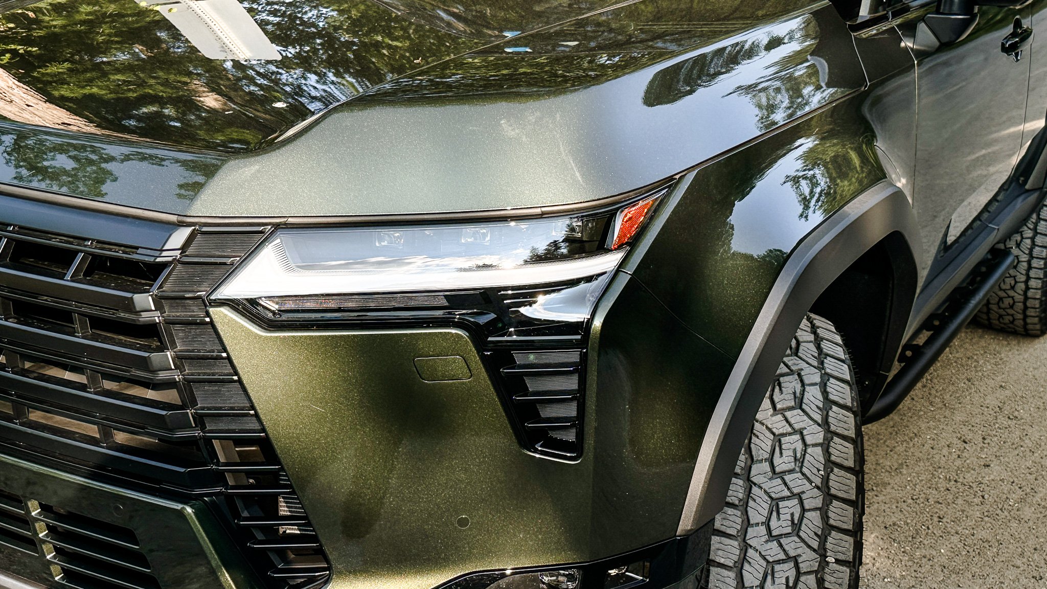 Headlight detail on the 2026 Lexus GX 550 Overtrail+. Image: Ben Yamin Schmidt.