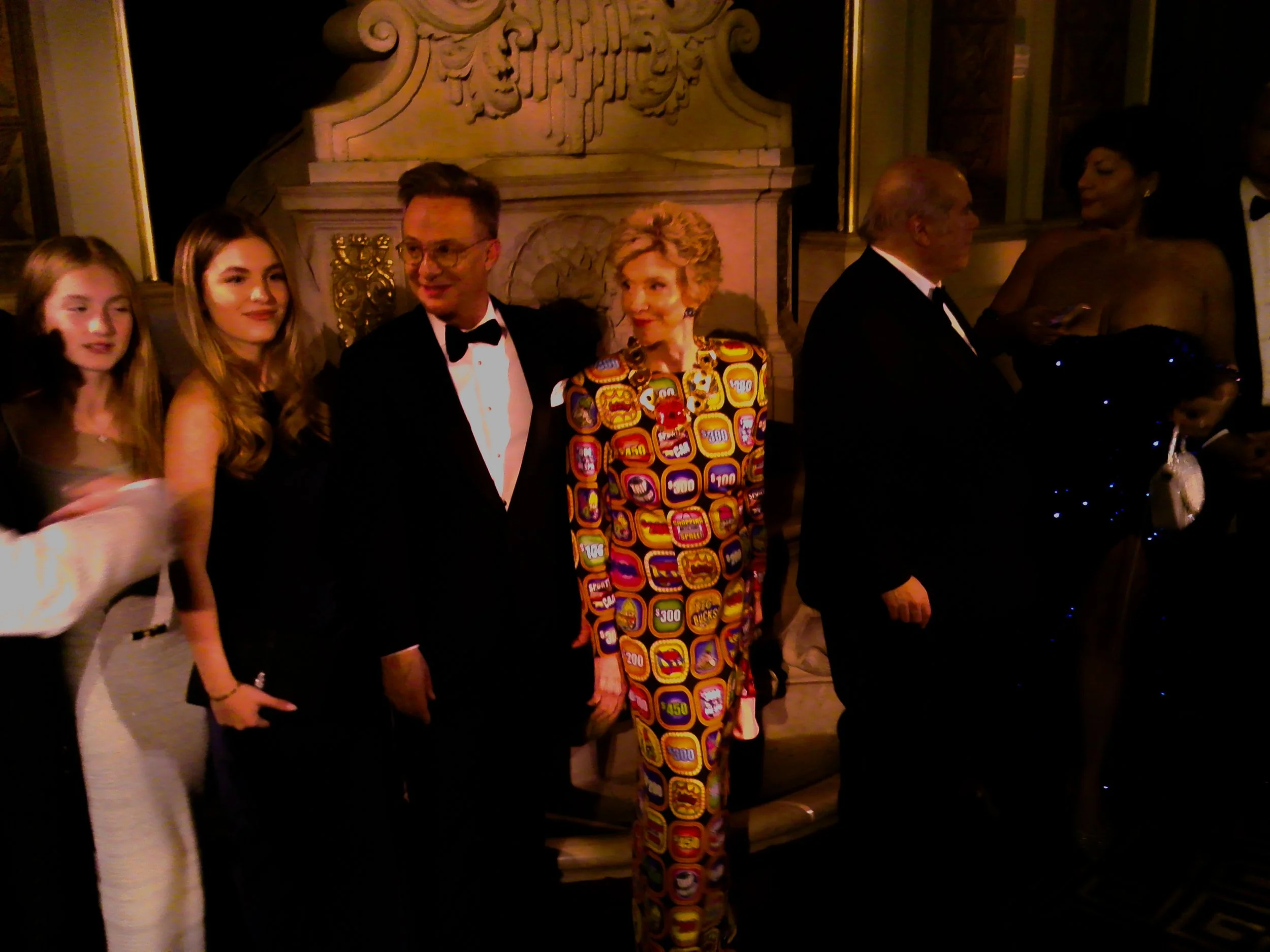 Jackie Weld Drake (center) and Fiesta! 2026 Honoree Ben Rodriguez-Cubeña (center left). Jackie wears Moschino. Image: Ben Schmidt.