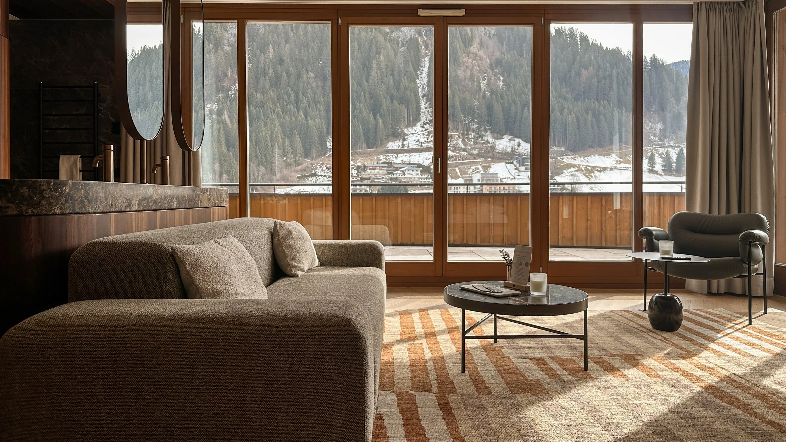 Living room of the Hochgefühl penthouse suite at Hotel Nesslerhof Grossarl in the Austrian Alps. Image: Ben Schmidt.