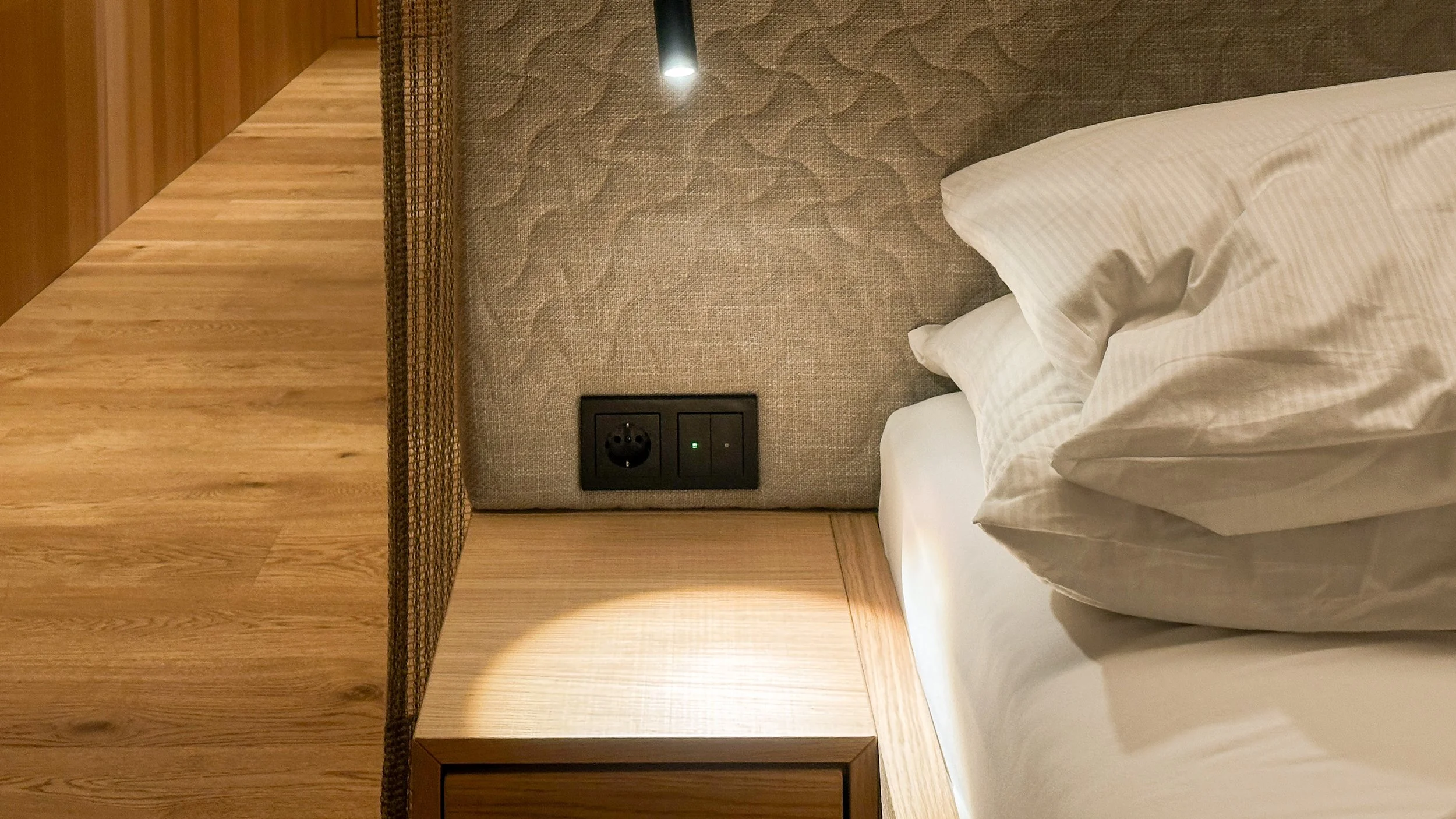 Hotel Nesslerhof Grossarl  “Lebensfreude” Double Room bedside. Image: Ben Schmidt.