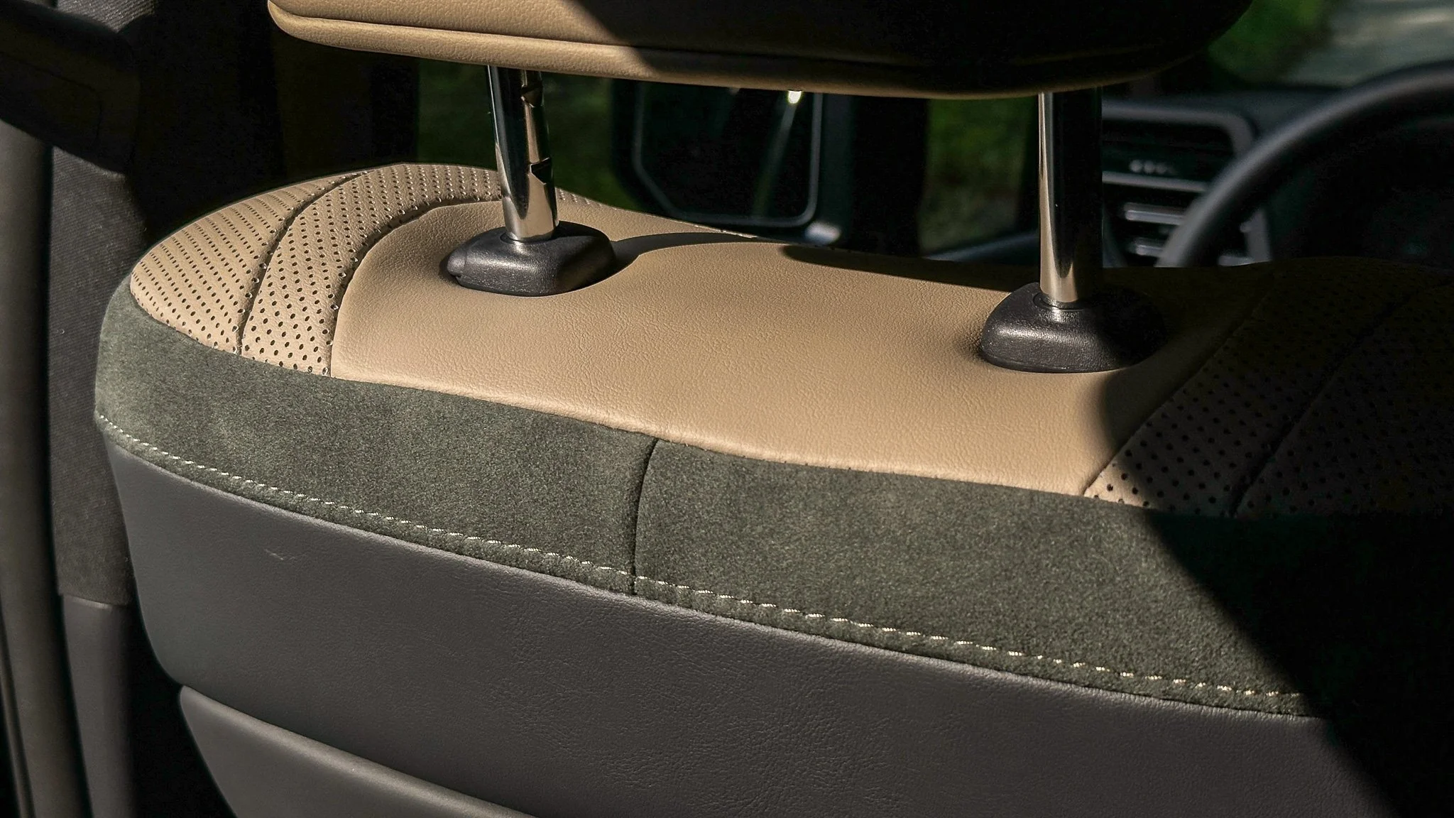 Black NuLuxe with Olive Ultrasuede accents in the 2026 Lexus GX 550 Overtrail+. Image: Ben Yamin Schmidt.