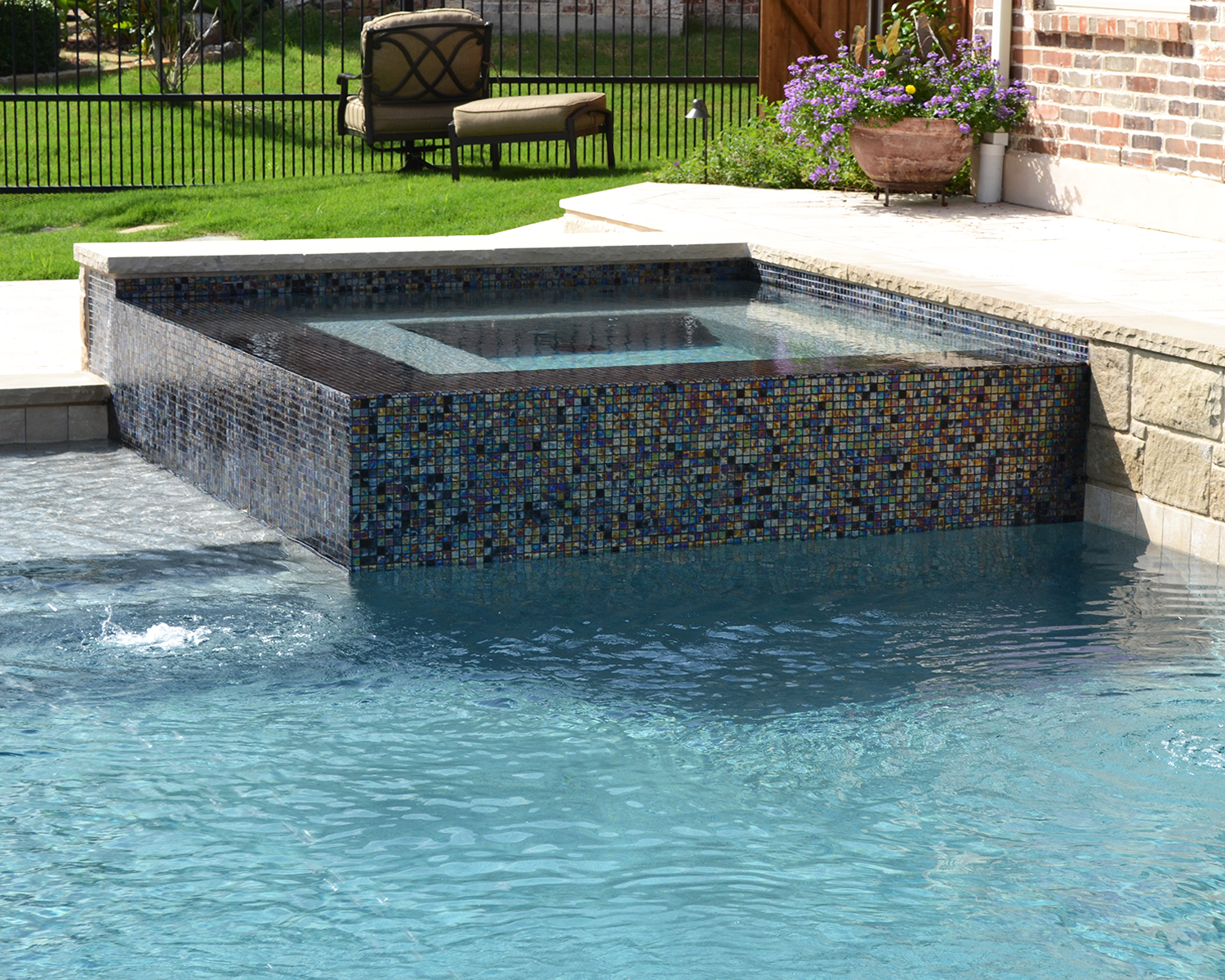 LakePointePools-custom-features-spa.mosaic.jpg