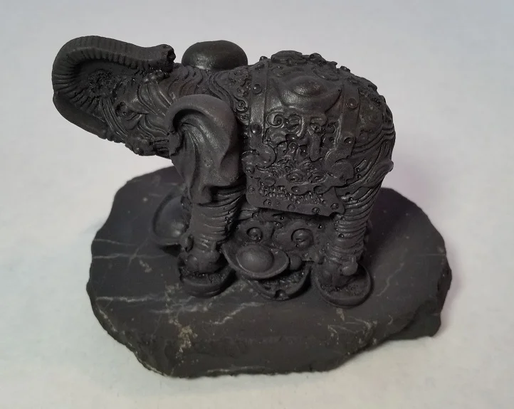 Shungite Elephant with Coins Left.jpg
