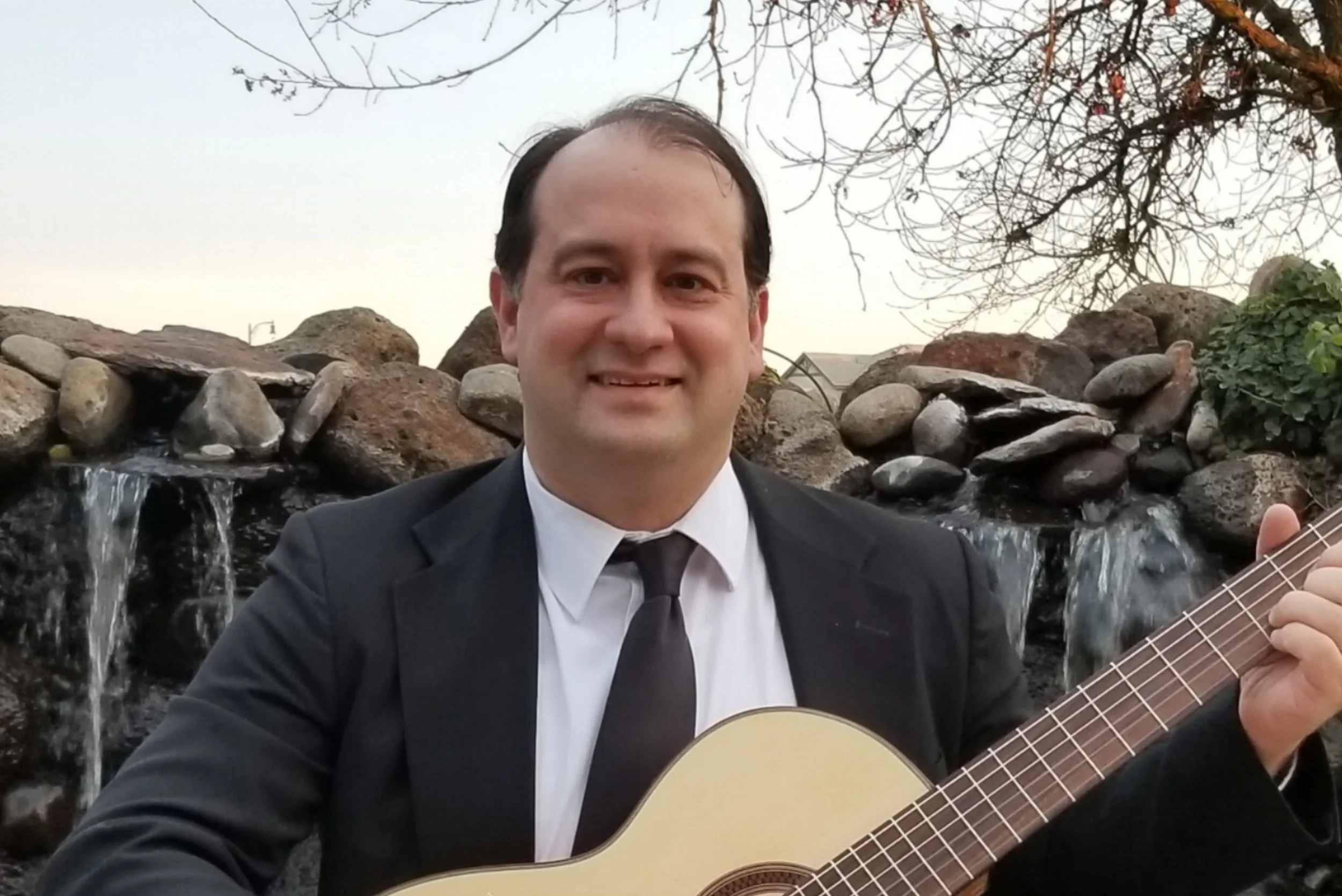 Bob Head Shot with guitar.jpeg