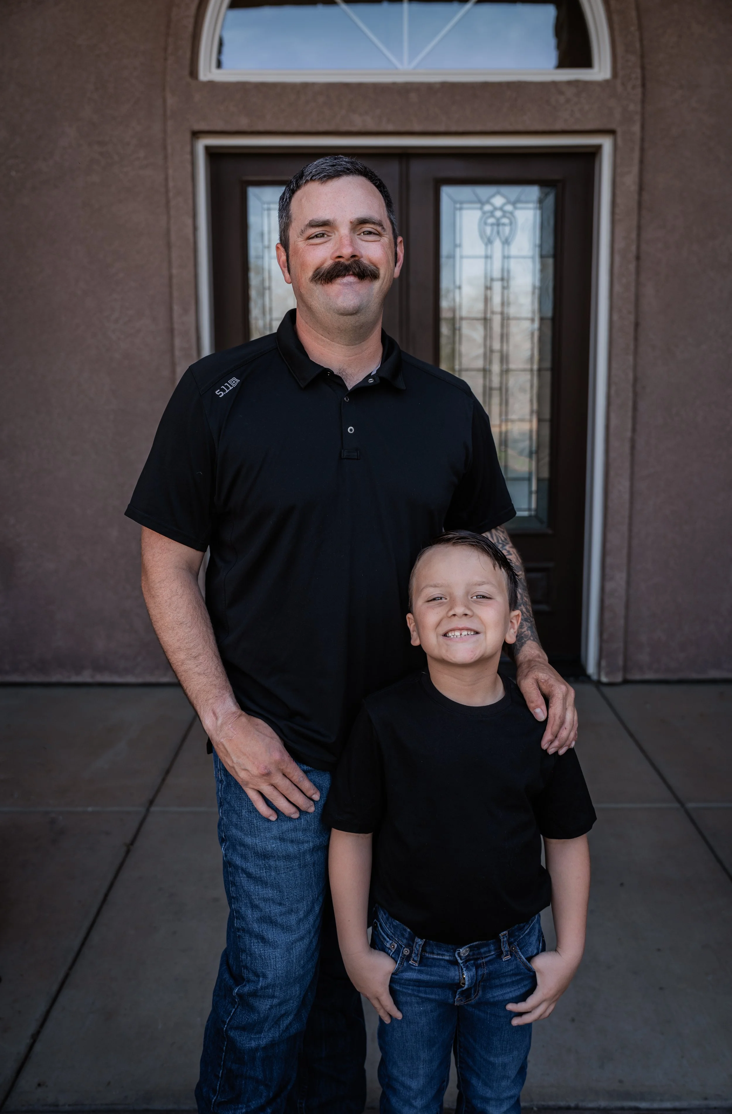 Father and son standing for a photo. Photo taken in Patterson, CA by local family photographer Mikaela Tosta Photography.