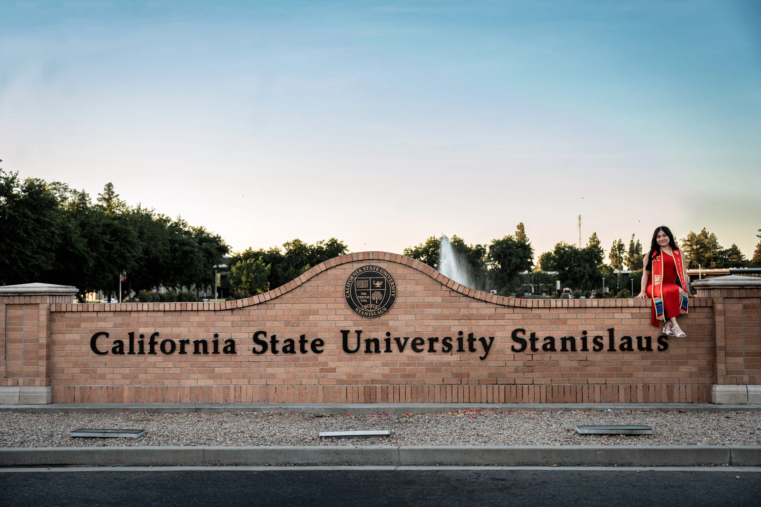 Photo of a Stanislaus State Graduate. Photo taken in Turlock, CA by senior photographer and grad photographer Mikaela Tosta Photography.