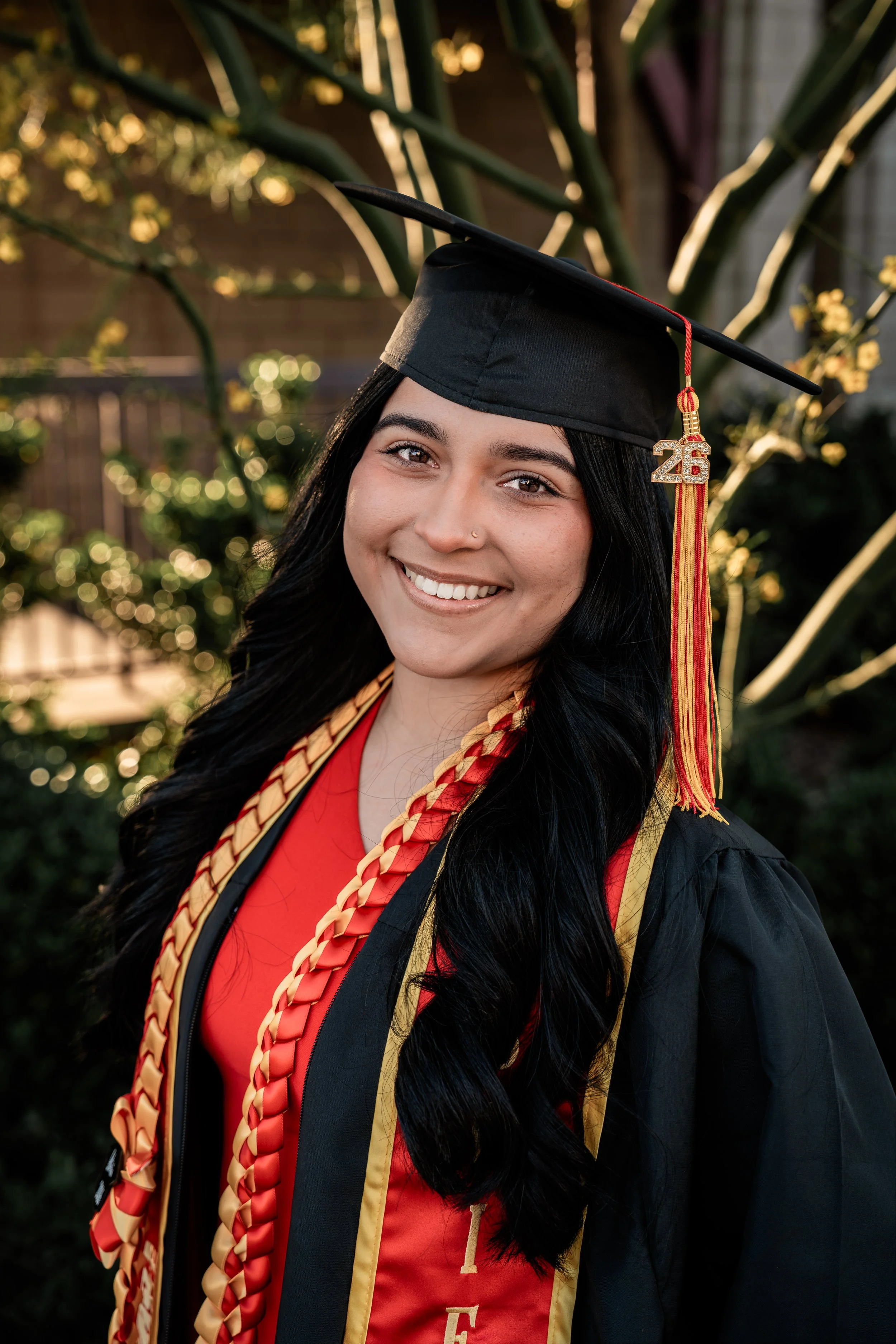 Photo of a Stanislaus State Graduate. Photo taken in Turlock, CA by senior photographer and grad photographer Mikaela Tosta Photography.