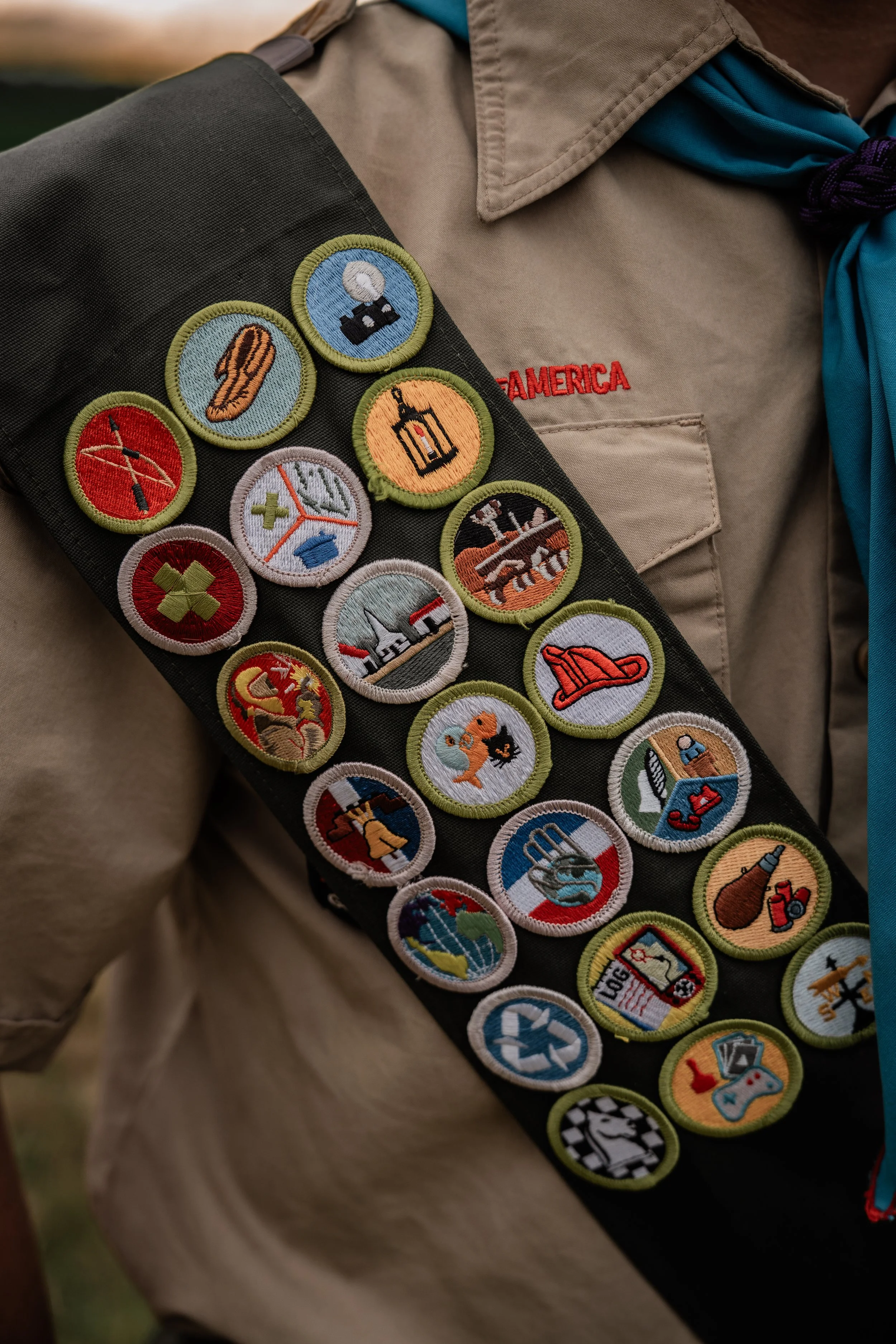 patches from Boy Scouts on a sash. Photo taken in Crows Landing, CA by Mikaela Tosta Photography
