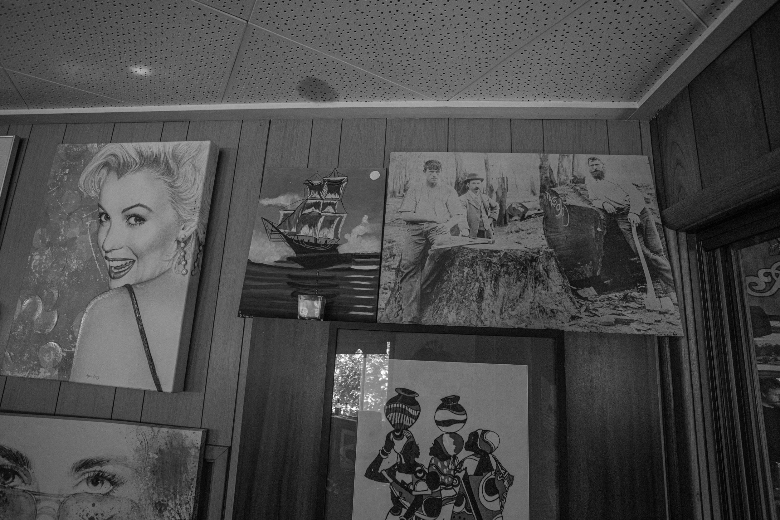  Bell Bird Hotel with an image of loggers next to Marilyn Monroe from the 1900’s. 