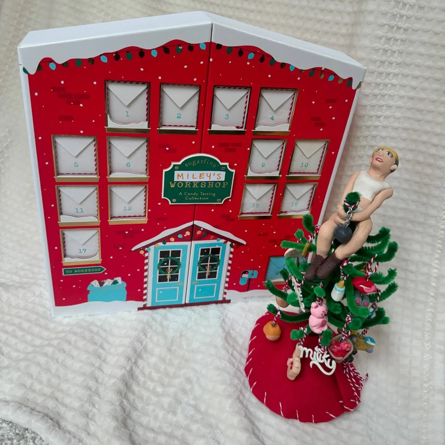 Made this @mileycyrus advent calendar for my brother last year (repurposing a cute Sugarfina box). 
Ornaments are pulled from her music videos or song lyrics. These were so hilarious and fun to make! 🎄
.
Unfortunately, I got hand foot mouth disease 