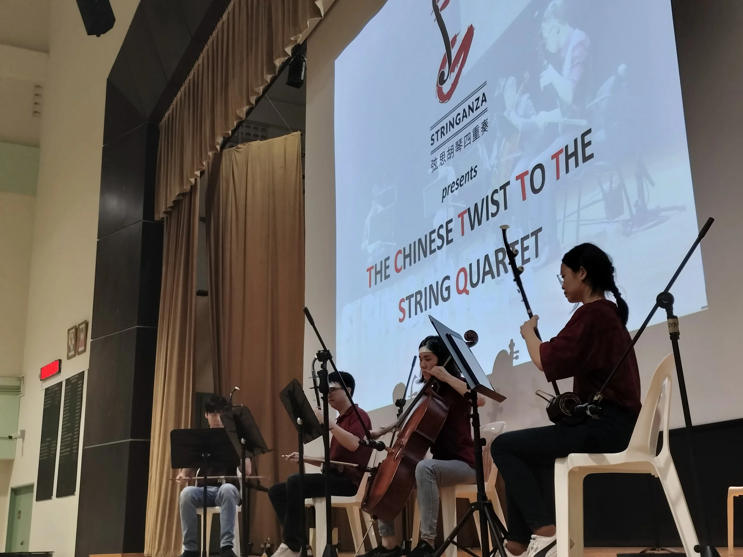 Stringanza Quartet performing its Chinese music Arts Education Programme in a school hall