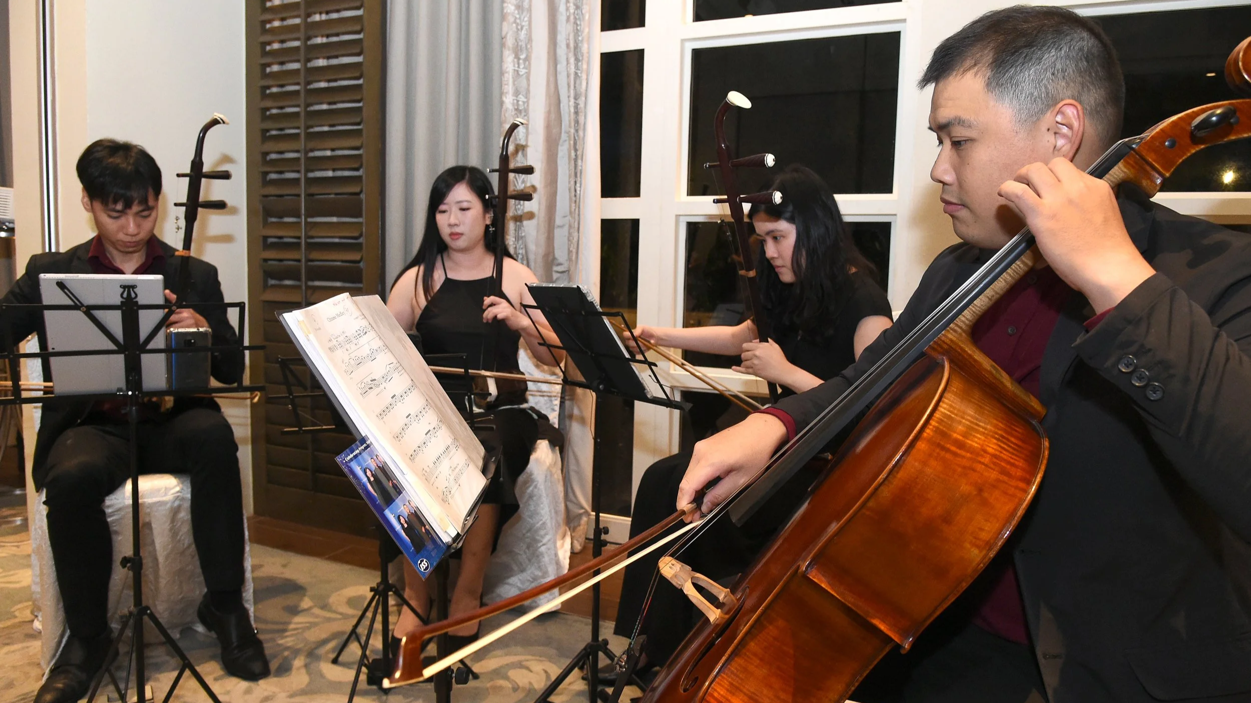 Close up of Stringanza Quartet performing a highlight set at ISS Facility Services' 30th Anniversary Dinner Celebration at Shangri-La Hotel Singapore