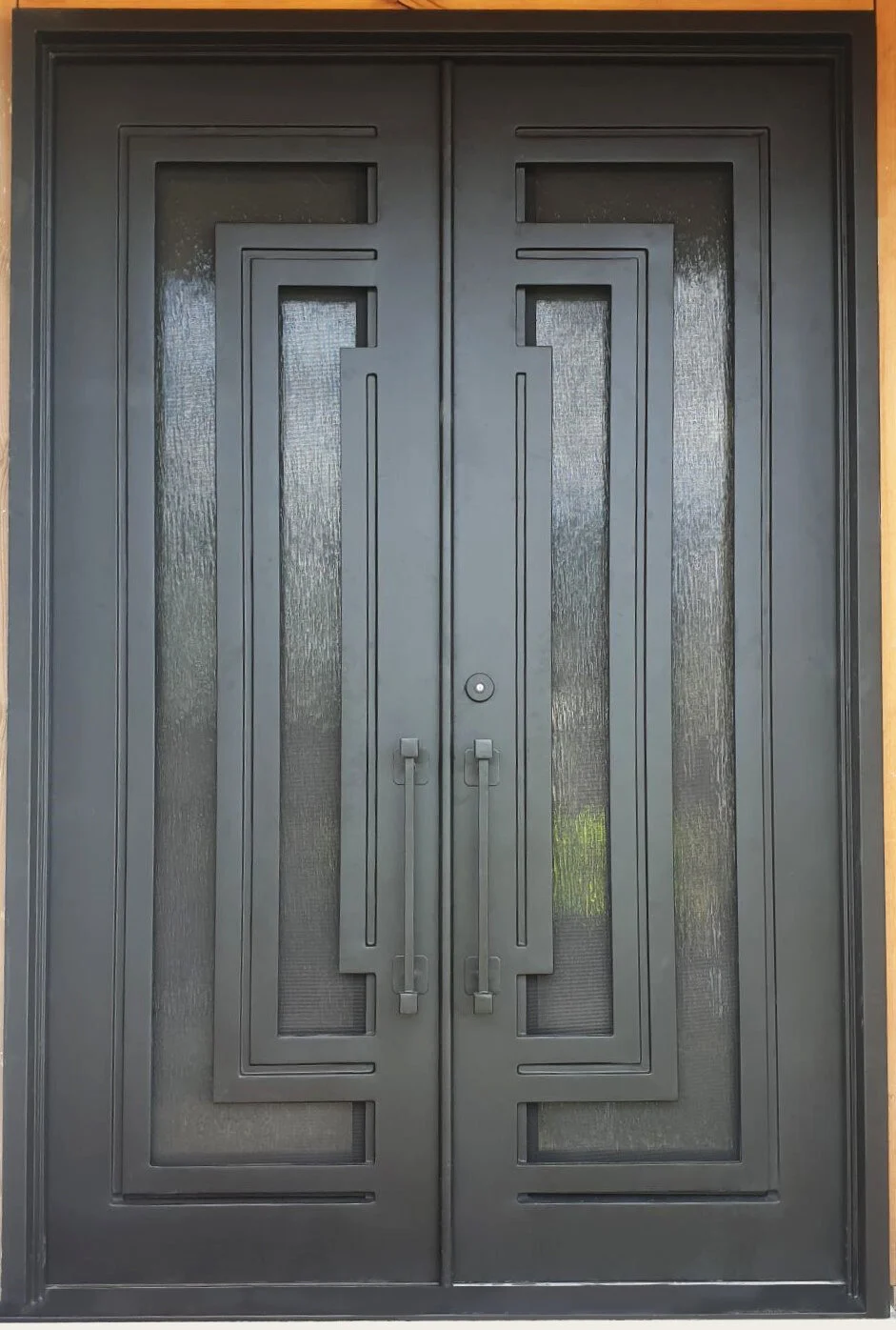 A sturdy wrought iron double door