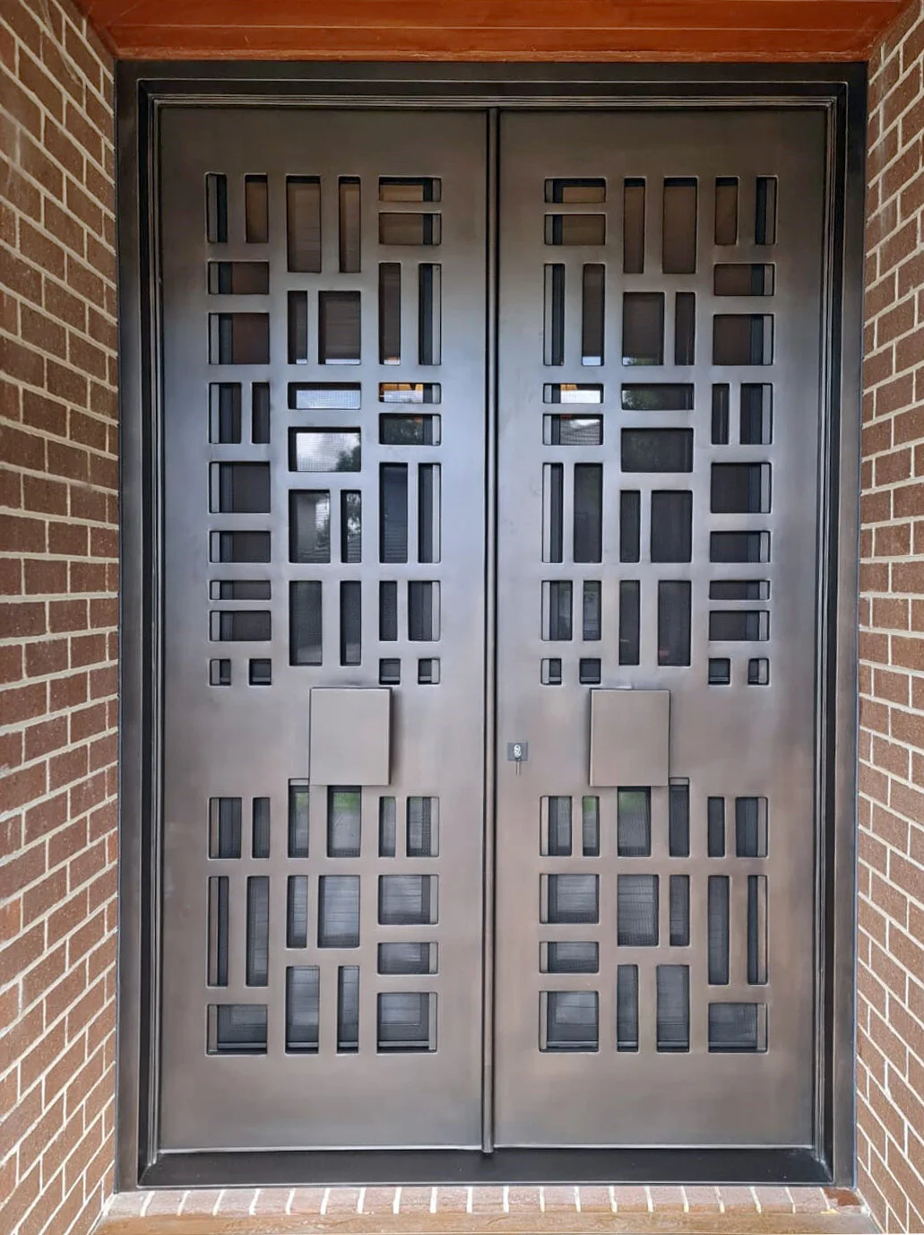 A beautiful intricate modern wrought iron door