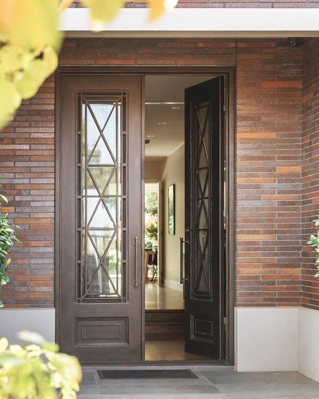 Custom Wrought Iron Doors — Ornamental Iron Works - Ornamental Iron Works