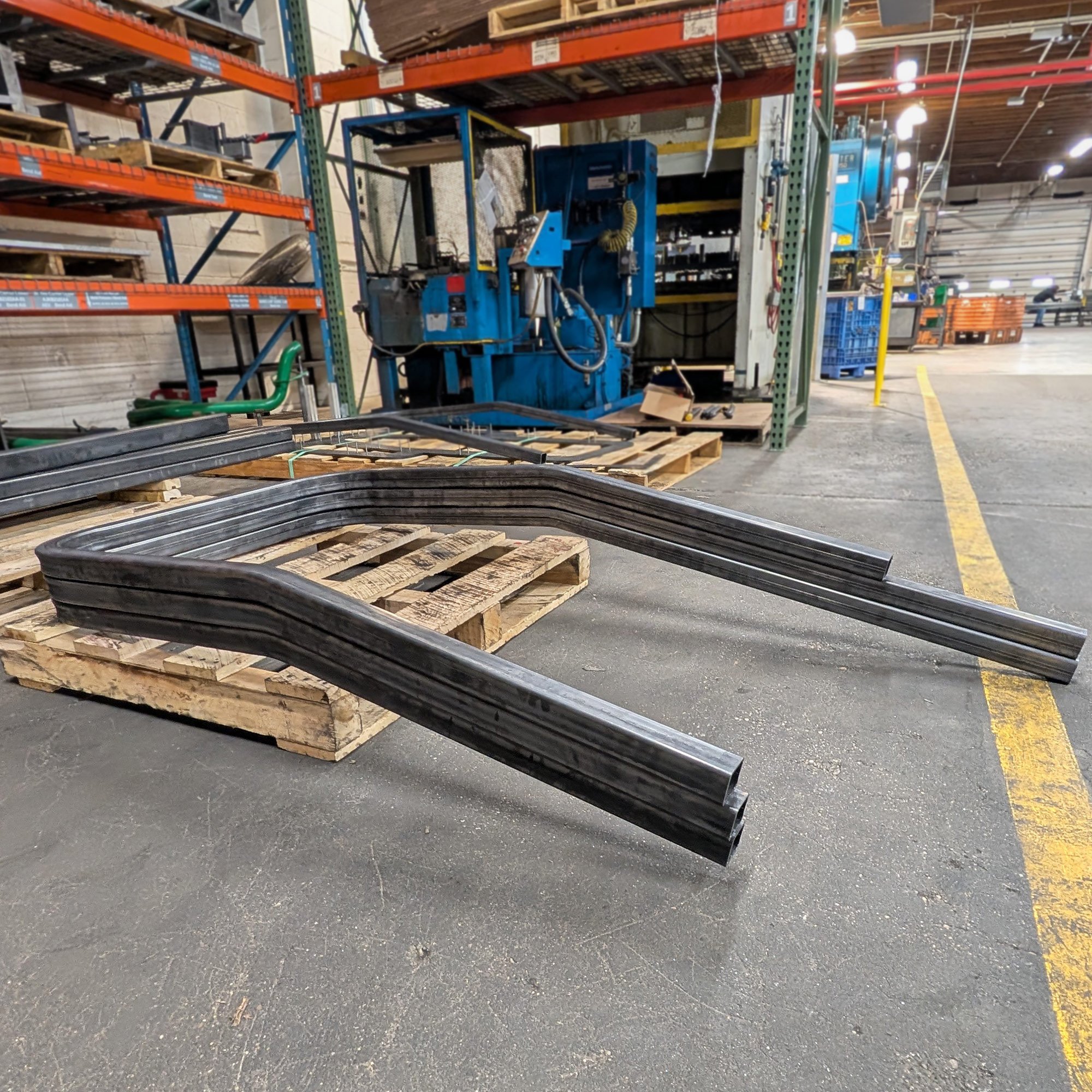 CNC-bent rectangular steel tubing for structural and frame applications.
