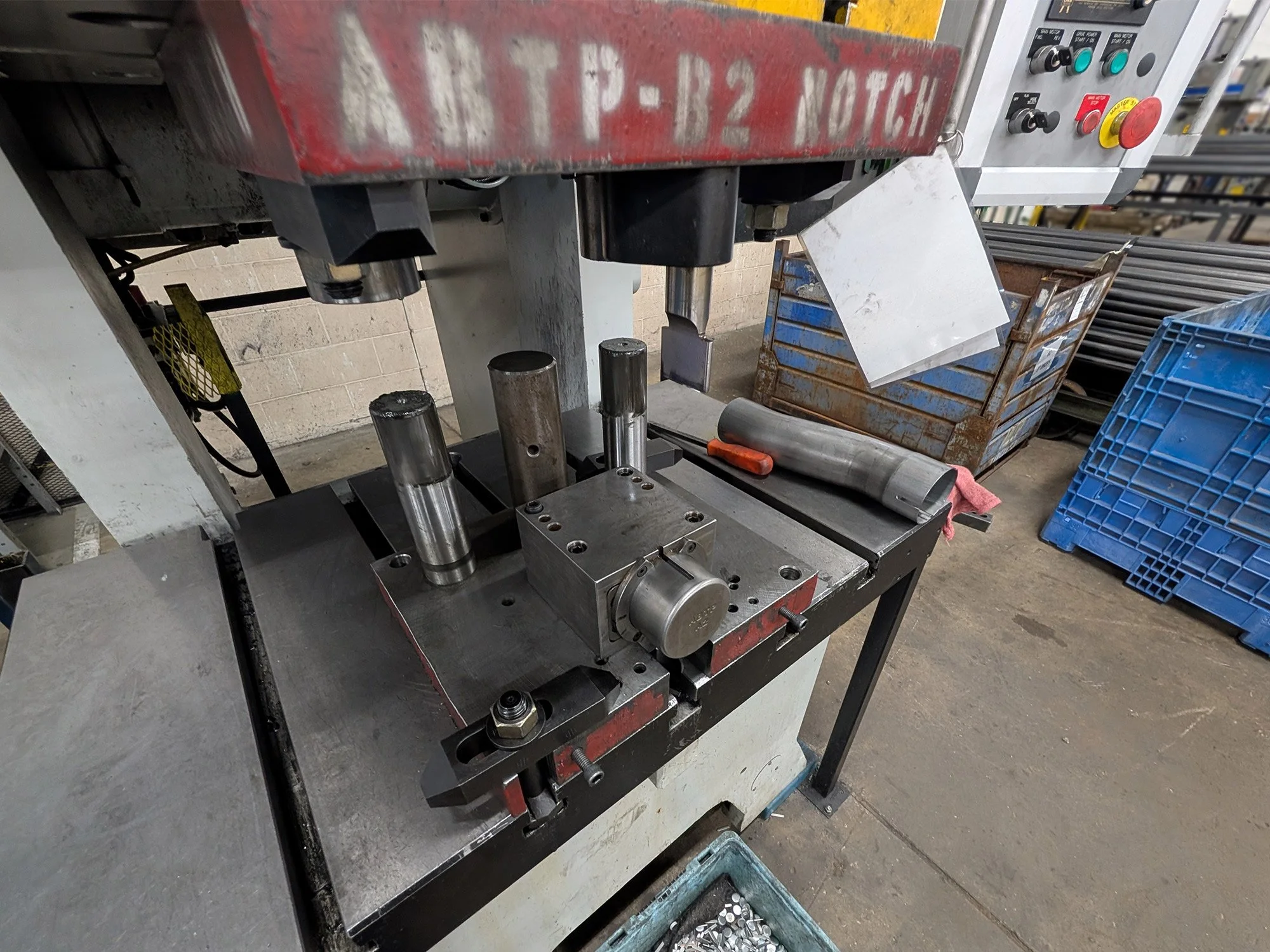 ABTP B2 notch press with custom tooling and tube at All Bending and Tubular Products