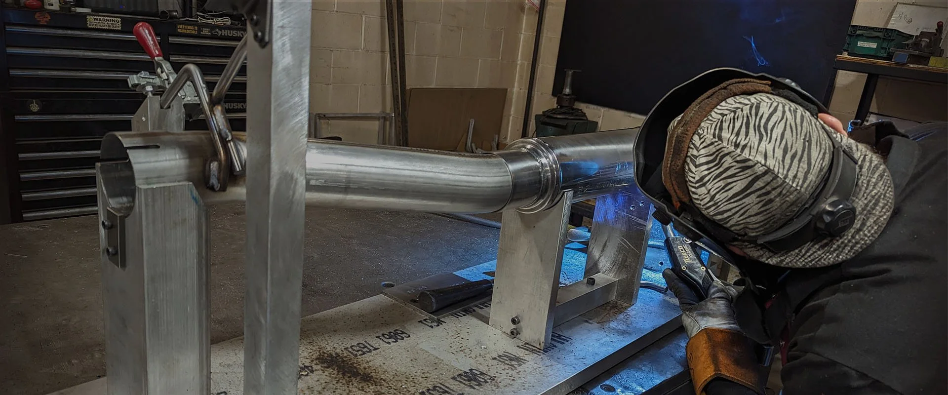 MIG welding on exhaust system components at ABTP