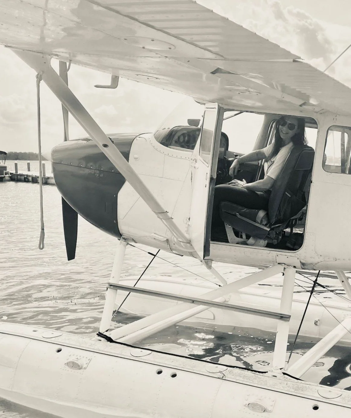 Juliana Turchetti in the cockpit of a seaplane