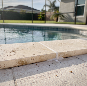 Travertine pool coping and stone pavers.